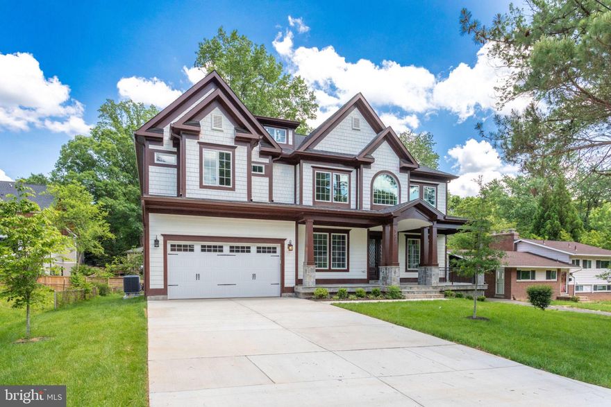 Outstanding new craftsman home in MCLEAN high school pyramid. Low mantainance hardiplank elevation. Superb finishes and great floor plans. Dramatic entry hall, wide welcoming staircase, spacious sun filled rooms, gourmet kitchen with Thermador appliances, upgraded granite and cabinets. Deluxe trim work through-out, oak hardwood in entire 2 levels, tile floor in basement.Large In law-suite in main level, beautiful master suite with huge sitting area, exotic master bathroom with separate soaking tub,heated floor, huge walking closets, flooded with 4" led recess lights. Dedicated exotic bathroom to each bedroom, fantastic wetbar with huge serving counter-top and wine racks.  front load 2-car garage,  landscaped backyard..