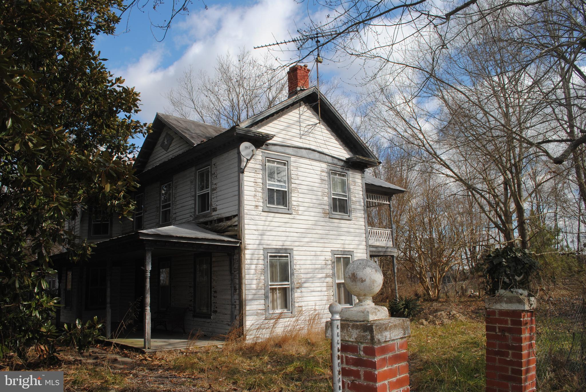 PROPERTY IS IN NEED OF MAJOR RENOVATION. BEST SUITED AS A TEAR DOWN OR PARTIAL TEAR DOWN. EQUIPMENT STORED ON EXTERIOR TO BE REMOVED FROM THE PROPERTY PRIOR TO SETTLEMENT. SELLER HAS NO INFORMATION REGARDING LEAD BASE PAINT, WELL OR SEPTIC. PROPERTY HAS BEEN USED FOR YEARS AS STORAGE FOR EQUIPMENT. BEING SOLD "AS-IS". ELECTRIC NOR HEAT IS ON. USE CAUTION WHEN VIEWING PROPERTY, MOLD MAY BE PRESENT. GREAT POTENTIAL AND MUCH HISTORIC CHARM, COULD BE RESTORED. IN-GROUND POOL "AS-IS" HAS NOT BEEN USED IN YEARS. POTENTIAL FOR 2 FULL BATHS. MANY FIREPLACES, DUAL STAIRCASE. SOME PICTURES SHOW CONDITION AT PREVIOUS STAGES.