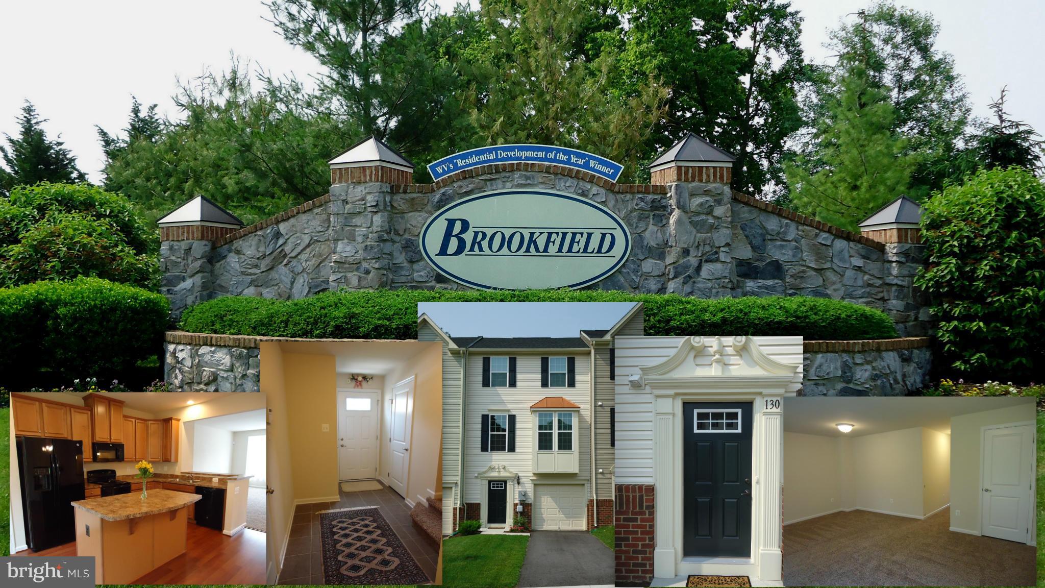 Gorgeous Townhouse(Priced Below Purchase Price),backs to woods.Energy effic.windows,open floor plan,new upgraded carpeting,tiled entry way & bathroom floors, Gourmet Kitchen w/Island,1st floor half bath w/finished walk out basement & family room,master suite, walk-ins,beautifully finished master bath w/luxury double shower head,3rd level laundry,recessed lighting, garage, 3 pkg spaces.A MUST SEE!