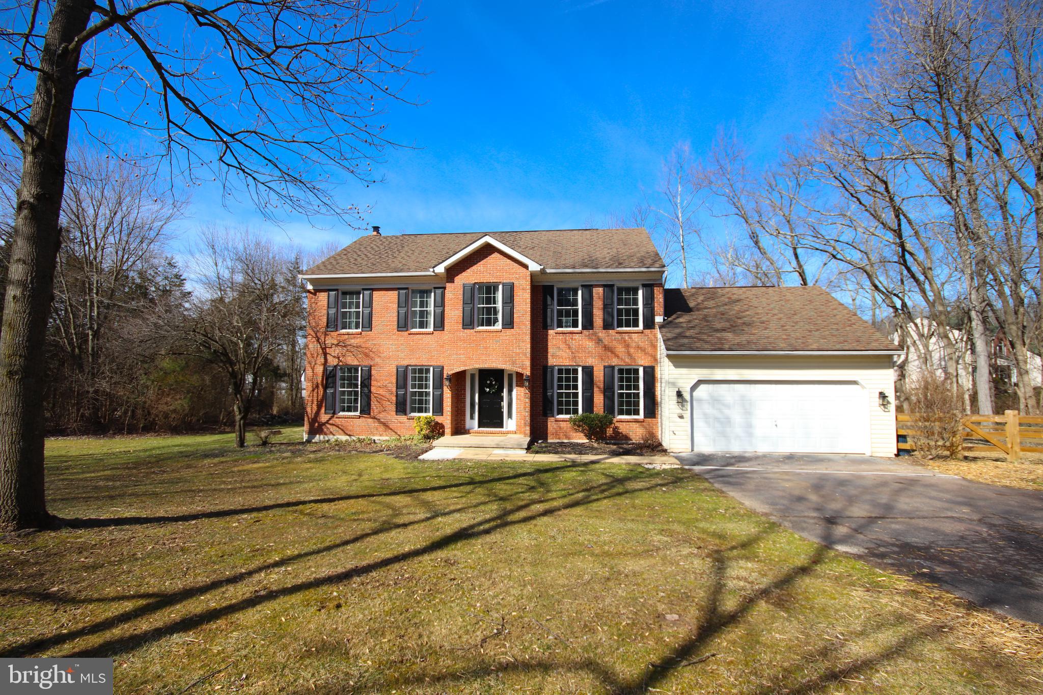Lovely brick front colonial on cul de sac!  Lower Pottsgrove lot sits on over 1.50 wooded acres.  This home features all new fresh paint, brand new porcelain floors throughout the first floor, all brand new windows, a massive living room/family room with a brand new propane fireplace and a formal dining room with crown molding and wainscoting!  There is also a newly remodeled powder room with a shiplap accent wall and a new eat in kitchen including island and subway tile backsplash and farmhouse sink.  French doors lead to a rear double deck and custom gazebo overlooking the wooded property.  Great entertaining space just waiting for you, your family and friends to enjoy!  A first floor laundry with access to a 2 car garage finishes out the first floor.  A full sized basement with new French drains, sump pumps, new water softener/neutralizer and ROI unit for well water.  The second floor is home to a large master bedroom with brand new barn door, walk in closet and a beautiful en suite complete with a double sink vanity and fabulous 3x9 ft. shower including 3 shower heads!  Three great sized bedrooms and a hall bath complete with soaking tub complete this level.  Peace and tranquility is what you will find with this home on this quiet street.