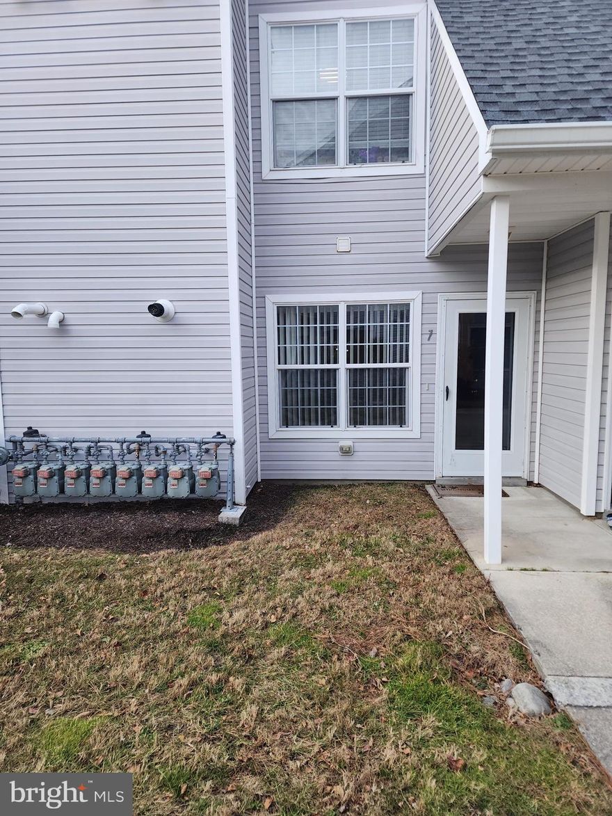 Fantastic Condo In the Meadows District of Ocean Pines. Spacious first floor 3 bedroom, 2 bath condo. Totally open floor plan with a large kitchen that includes a Pantry Closet, a kitchen island, and dining area as well, Overlooking the living room The kitchen opens to the great room and dining area and features a convenient breakfast bar. The primary suite offers a large walk-in closet and private bath. The second bedroom is generously sized with access to a second full bath. The third bedroom includes French doors and works well as a home office or study/den. A private patio is located just off the great room for outdoor relaxation. This condo includes one assigned parking space, along with additional parking for guests. Conveniently located within walking distance to restaurants, a bagel shop, dog park, tennis and racquetball courts, and the community vegetable garden. Residents also enjoy Ocean Pines amenities, with the beaches of Ocean City just minutes away.