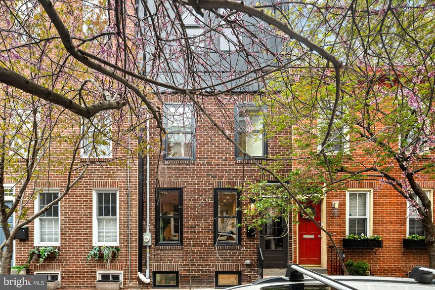 Just Listed in Graduate Hospital!
Welcome to your dream home—completely reimagined and rebuilt from the studs up! This stunning 3-bedroom, 3-bathroom residence is the perfect blend of thoughtful design and modern luxury, nestled on a quiet, tree-lined street in one of Philly’s most beloved neighborhoods.

Step inside and be wowed by the sun-drenched open floor plan, ideal for both everyday living and entertaining. The first floor features a generous living and dining area, a spacious kitchen with a large island, sleek finishes, a full pantry, and a coat closet for added storage. Out back, enjoy the ease of a dedicated surface parking space—a true city luxury!

The finished basement offers incredible flex space with a full bathroom and built-in storage—perfect for a home office, guest suite, gym, or cozy media room.

Upstairs, two bright bedrooms and a stylish shared bathroom await on the second level. The entire third floor is dedicated to the private primary suite, complete with a spa-like bathroom, chic accent wall, feature lighting, and breathtaking Center City skyline views. This level also includes a laundry closet and convenient wet bar—ideal for your morning coffee or evening wind-down before heading up to the roof deck.

And speaking of rooftops—the split-level roof deck is a showstopper, offering 360-degree views of the Philadelphia skyline. It’s perfect for entertaining or relaxing under the stars.

Enjoy unbeatable access to Rittenhouse Square, the Schuylkill River Trail, and some of the city’s best dining and shopping. With proximity to Center City, UPenn, CHOP, and public transportation, this location truly checks every box.

All new systems and tax abatement round out this incredible offering.

Don’t miss your chance to own this thoughtfully designed gem in Graduate Hospital—schedule your tour today!