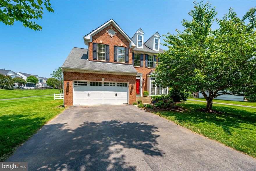 Perfectly positioned on a spacious lot that borders open community green space, this rare colonial is located in the sought-after Manor Oaks community. The home offers a unique sense of spaciousness and timeless curb appeal, with beautiful upgrades that include a recently enhanced eat-in kitchen with quartz countertops and gas cooktop, new flooring throughout, fresh paint, updated lighting and ceiling fans, and a fully finished customizable basement with a rough-in for a full bathroom. The kitchen features stainless steel appliances and connects seamlessly to a formal dining room, sunlit living room with a gas fireplace, and a versatile piano room with two bay windows—ideal as a home office or creative space. Four generously sized bedrooms include a spacious primary suite with a walk-in closet and private updated  bath boasting dual sinks and a separate shower and soaking tub.  The newly finished basement adds flexible space for a home theatre, workouts, or play. Additional main level highlights include a bright laundry room with a large window, convenient guest bath, two story foyer, new LVP flooring in the foyer, kitchen and all bathrooms, newer HVAC and extended two-car garage and interior access.  The exterior offers a fully fenced in backyard that has a tranquil, wide-open feel thanks to the adjacent open space and beautiful landscaping. 

As part of Manor Oaks, you’ll enjoy access to a community swimming pool, picnic area, multiple playgrounds, tennis courts, and walking paths that wind through extensive common areas, perfect for enjoying the outdoors right in your own neighborhood. Ideally located just minutes from the popular Olney shopping and dining district, medical facilities, Olney Theatre Center, golf courses and easy access to commuter routes including ICC/1-200, you’re also close to several nearby parks offering scenic trails and outdoor adventure.  This is a rare blend of classic charm, thoughtful updates, and modern-day convenience in one of Montgomery County’s most vibrant pockets.