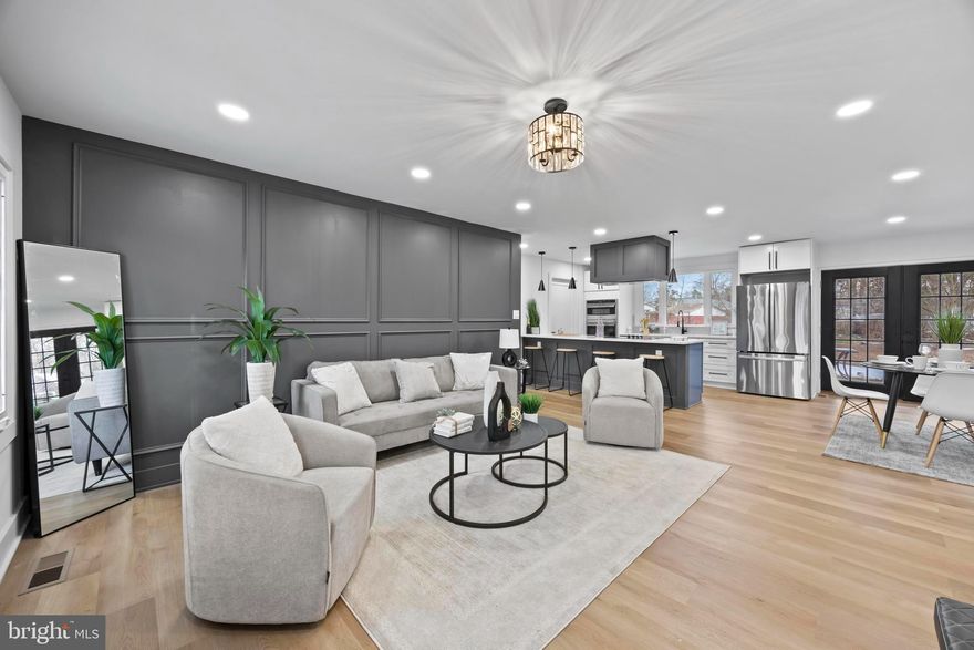 This home was taken down to the framing and then beautifully, COMPLETELY, renovated. Now it’s ready for new owners to enjoy and make their own.

The home is beautiful with LVP flooring, neutral paint, recessed lighting and modern fixtures.  The kitchen boasts beautiful cabinetry, countertops, stainless steel appliances and an island that provides lots of workspace and eating space.  The laundry room features new washer and dryer, cabinets, a sink, and an expansive pantry closet. The hall bath and the primary suite bath have been renovated with modern tiles, vanities, sink and shower fixtures.

The renovated exterior includes all new black framed windows, gutters and downspouts along with the freshly painted house.  There is also an Electric Vehicle charging station.
Sit on the patio, looking at a park like back yard setting, that opens to approximately ½ acre of adjacent vacant land.
We are conveniently located near shopping, dining, and commuter routes.  Less than 6 miles to 2 Metro stops. Easy access to Dulles International Airport, bike trails and public transportation.  30 miles to DC.
Close to libraries, parks, community recreation centers, and amazing hiking trails.
This home offers the comfort and peace of mind of a fully renovated interior, making it an ideal choice for buyers seeking modern style and low maintenance living.