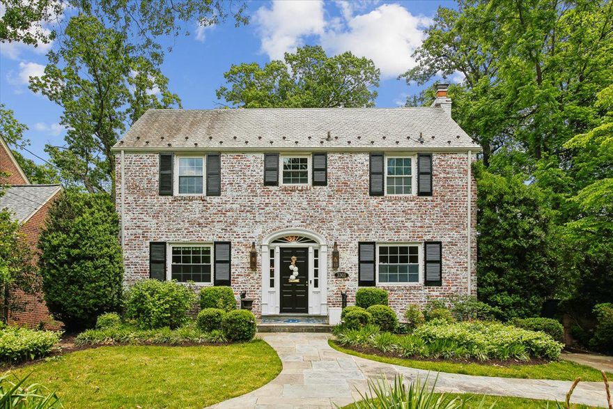 The home you’ve been dreaming about in the heart of Beverly Hills is waiting for you! Whitewashed brick with gas lanterns and a brick driveway welcome you to this stunning 5 bedroom/5 full bath colonial that is beautifully updated and move-in ready. Enter into the foyer and head to the main level bedroom/office on the left that can double as a great work from home office or cozy den, complete with full ensuite bath featuring gorgeous sconces and custom Hermes equestrian wallpaper. To the right of the foyer, the spacious living room is perfect for entertaining with a gas fireplace and built-in speakers. Beautiful crown molding accentuates this space along with rich, dark hardwood floors. The living room flows easily into the light-filled sunroom and kitchen where huge floor to ceiling windows overlook the treetops and provide an airy feeling and total privacy. The sunroom features a beautiful wainscoting ceiling. The well-appointed kitchen is light and bright and features stainless appliances including a new Sub-Zero refrigerator, new Miele dishwasher, two gorgeous Colleen and Company lanterns above the island, soapstone counters, white shaker-style cabinets with acrylic and gold cabinet pulls, and a coffered ceiling. Off the kitchen is an amazing custom butler's pantry with wet bar and wine refrigerator, and cabinetry and drawers for storage. The dining room has beautiful trim work and flows easily into the kitchen and living rooms - ideal for entertaining. There are three bedrooms and three full bathrooms on the upper floor, and a convenient laundry with new washer/dryer. Each bathroom has marble floors and tiling and updated fixtures. The master bath is a spa-like retreat with custom lighting and marble tiling. The master bedroom is spacious and bright, with huge picture windows, vaulted ceilings, large walk-in closet, and a beautiful chandelier. On the finished lower level is a fifth bedroom and full bath, utility and additional laundry area with new washer/dryer, a mudroom/storage room with side entry, and a spacious family room that walks out through french doors to a covered bluestone patio – a great space for relaxing. The lush backyard is terraced with an open area for playing and enjoying relaxing evenings under the stars, and improve your golf game on the new putting green in the side yard! Special highlights of this home include a whole house generator for peace of mind in any weather, dual zone heat/ac, large floor to ceiling windows, and so much more. Move-in ready and waiting for you to enjoy living on a cul-de-sac in the heart of Beverly Hills! Just a short walk to "The Pit" park and an easy commute to DC - welcome home!