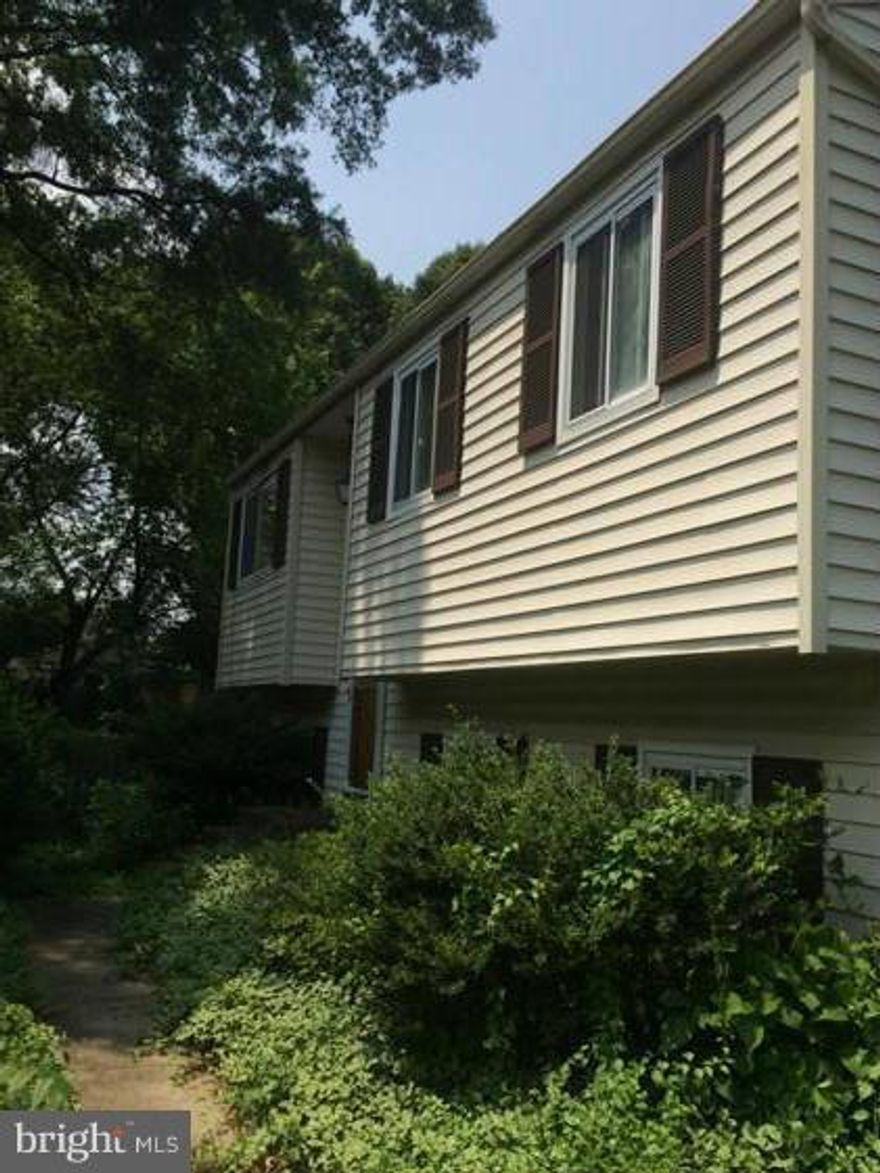 Great Severna Park school system. Water privileged. Quiet community. New wall to wall carpet. Large deck. Large yard (extra 1/2 lot use). Central air. Forced air heat. New energy efficient heat pump. Newer 50 gallon water heater. Low maintenance vinyl siding. Newer vinyl windows. New paint on interior. Additional kitchen/wet bar in lower level. Additional refrigerator.