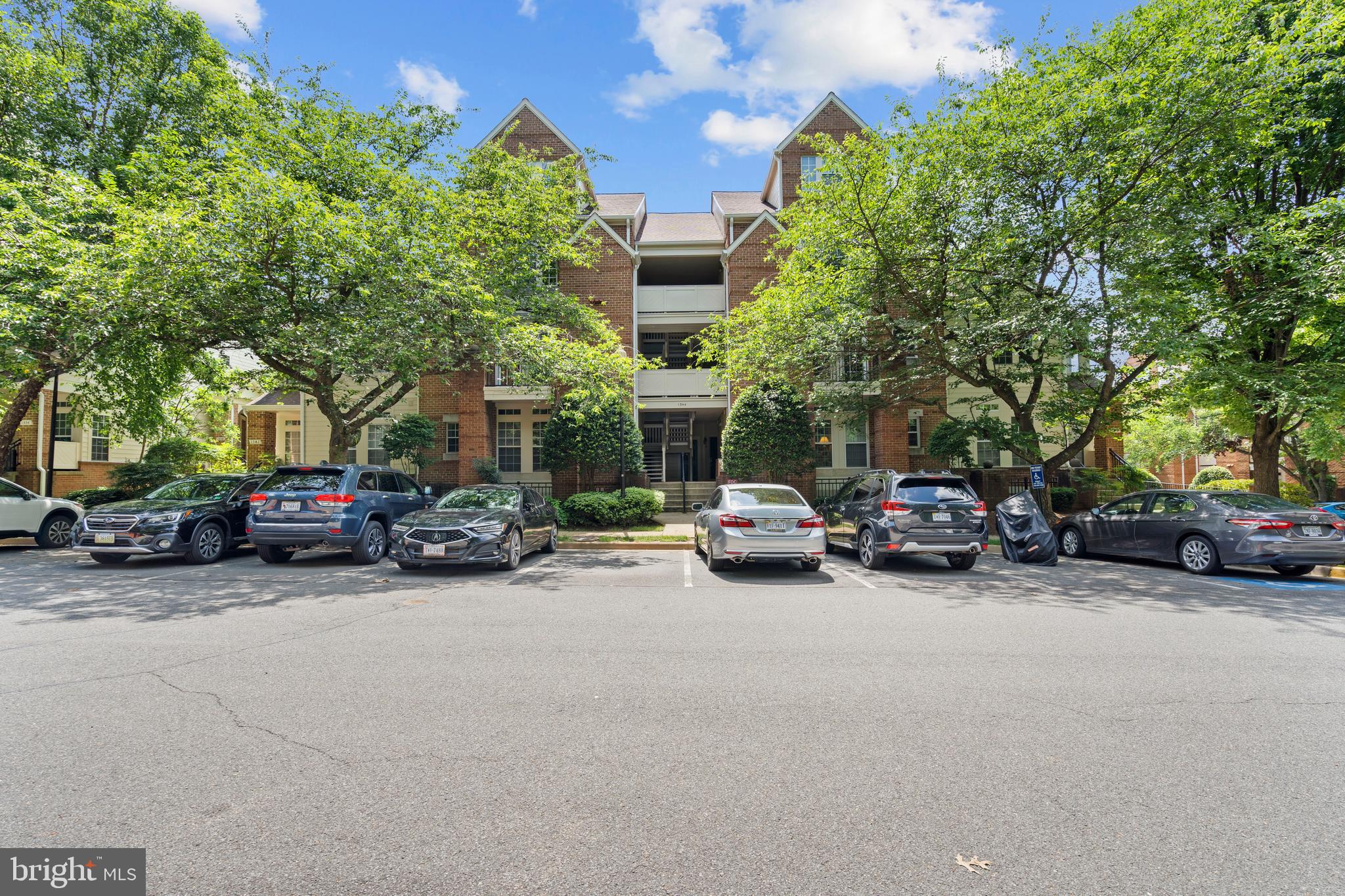 Spacious Welcome to this light-filled and beautifully updated 2-bedroom, 2-bathroom condo located on the second floor in the desirable North Point community! This stunning home features brand-new granite countertops, 9-foot ceilings, and an open floor plan with rich hardwood floors that flow seamlessly through the living and dining areas. A cozy fireplace adds warmth and charm to the living space, perfect for relaxing evenings or entertaining guests.
The kitchen is equipped with stainless steel appliances, ceramic tile flooring, and new granite counters that elevate both style and function. A convenient in-unit washer and dryer are located nearby for added ease. Step out onto the generously sized private balcony overlooking a peaceful landscape of trees—ideal for unwinding or hosting friends. Both bedrooms are spacious and privately tucked off a central hallway. Additional storage is available in a dedicated storage unit located just off the patio. Residents enjoy full access to Reston’s exceptional amenities: 17 swimming pools, tennis courts, playgrounds, miles of scenic trails, and access to the lake. Additionally, you're just minutes from the North Point Village Center, which offers a variety of shopping, dining, and entertainment options.
Please note: In addition to the monthly condo fee, a special assessment of $237 per month is currently in effect for a period of 2 years, ending in December 2027.