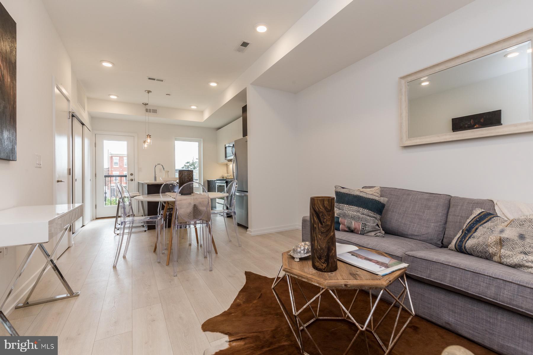 This immaculate apartment is located in the heart of Brewery Row. Now Offering 2 months FREE: $1,295 net rent on an 18 month lease! Gross Rent: $1,455. The community features 63 townhouse-like apartments, offering a clean and contemporary living with modern, stylish finishes. Each pet-friendly unit features top of the line finishes, upgraded kitchen amenities, and an in-unit laundry. Many apartments also offer private gardens or patio space.
This 1Bedroom 1Bath flat apartment is available 8/1. Also features hardwood floors throughout, modern cabinetry and finishes, stainless steel appliances, and washers and dryers for convenience. This unit blends style, location, and value. Off street is available, private parking is also available for an additional fee.
Move in charges include: First Months Rent, Security Deposit, and a Second Deposit, commonly referred to as Prepaid Last Months Rent (to be returned after the first year). Additional terms may apply. Please see our rental application page for details.
Schedule your tour today!
