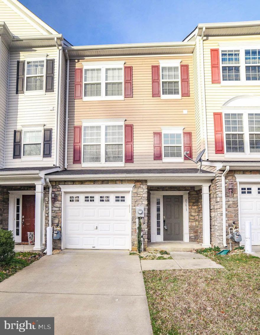 Great Location and you do not want to miss this fabulous town house that has beautiful hardwood floors throughout home.  Fenced in backyard and a huge deck outside mid level.  Updated appliances as well as updated bathrooms.