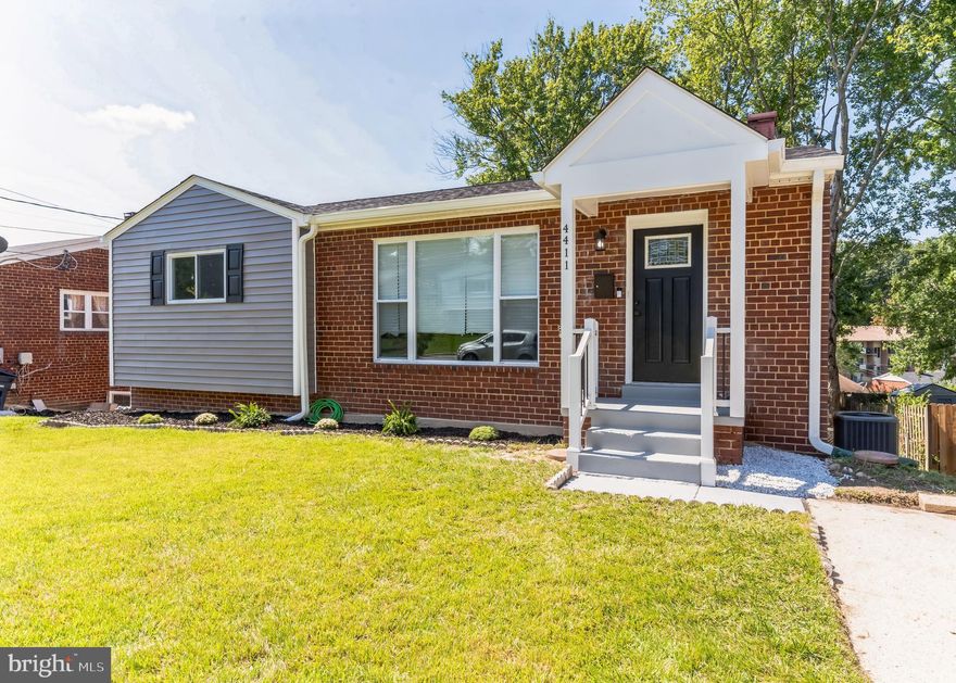 Welcome to 4411 23rd Pl –This stunning rambler has undergone a meticulous top-to-bottom renovation, ready to embrace the journey of a new chapter with its fortunate new owners. From its charming brick exterior to the fresh new roof, this home boasts an irresistible curb appeal that sets the stage for what's to come.
Step inside and be captivated by the seamless blend of high-quality craftsmanship and contemporary design that flows through every inch of this residence.  The main level welcomes you with  a spacious combined dining and living room warmth by a fireplace to enjoy with your loved ones. It also features a renovated kitchen with stainless steel appliances and marble countertops. You will also find in this level 3 bedroom and 2 full bathrooms providing convenience and privacy.
In the lower level you will find the walkout basement with two additional bedrooms and a full bath. The open area holds endless potential – whether it becomes a family room, a home gym, or a hub for hobbies. Through the basement's backdoor, a freshly seeded yard beckons, promising moments of leisure and relaxation during the upcoming milder months.
This home's renovation story leaves no detail unattended: a new roof, new HVAC system, new water heater, new appliances, and new windows have been thoughtfully incorporated to offer modern comforts while maintaining the property's classic charm.
Situated minutes away from 495 and 295, as well as a convenient metro station, and  major commuter routes.