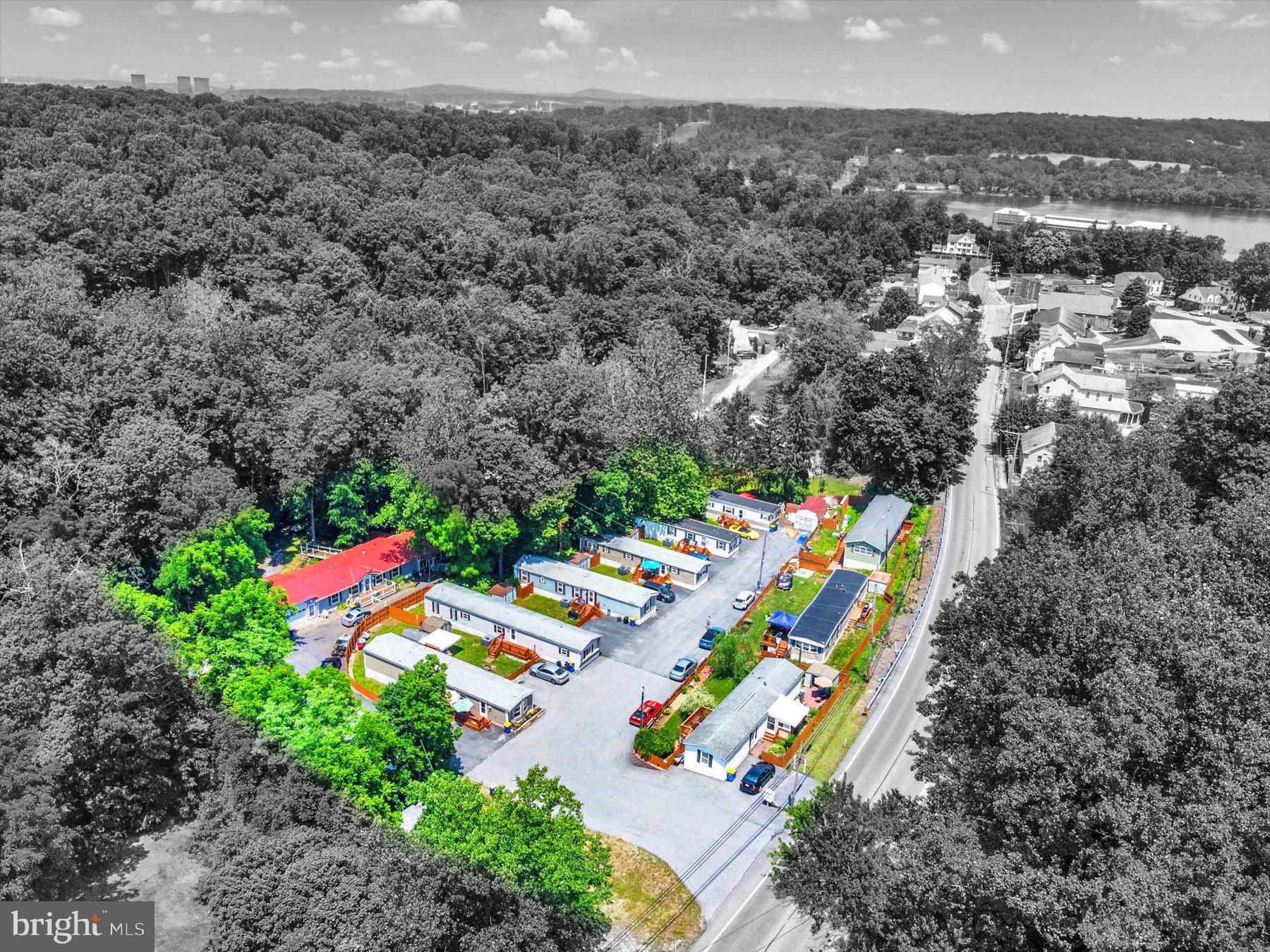 Great real estate investment! 10 mobile homes all rented and owned by the Rivers Ridge Mobile Home Park! Park Infrastructure and all homes renovated in the past 11 years with new kitchens, baths and flooring! There are Five 3 bedroom and 2 bath homes, One 2 bedroom and 2 bath home and Four 2 bedroom and 1 bath homes. Eight homes have drywalled interiors. All mobile homes have private parking, yards and storage sheds. Propane gas for heating and central air. Plus a few mini-splits. Most homes 900 sq ft M/L except for the modular home which is 2100 sq ft plus a 2-car oversize heated and cooled garage. Also an extra detached 20 x 12 garage. Long term residents with just one turnover in the last year. There are two wells that supply the water to the park and the sewer is public. Gross Income - $119,580. Expenses - $28,026. Net Income - $91,554. Cap Rate .077 Additional details of Income & Expenses in associated documents. Seller will consider 50% owner financing or may hold a second mortgage for a qualified investor. Qualified Buyers Only!