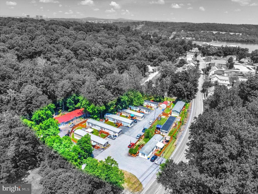 Great real estate investment! 10 mobile homes all rented and owned by the Rivers Ridge Mobile Home Park! Park Infrastructure and all homes renovated in the past 11 years with new kitchens, baths and flooring! There are Five 3 bedroom and 2 bath homes, One 2 bedroom and 2 bath home and Four 2 bedroom and 1 bath homes. Eight homes have drywalled interiors. All mobile homes have private parking, yards and storage sheds. Propane gas for heating and central air.  Plus a few mini-splits. Most homes 900 sq ft M/L except for the modular home which is 2100 sq ft plus a 2-car oversize heated and cooled garage. Also an extra detached 20 x 12 garage. Long term residents with just one turnover in the last year. There are two wells that supply the water to the park and the sewer is public. Gross Income - $119,580. Expenses - $28,026. Net Income - $91,554. Cap Rate .077 Additional details of Income & Expenses in associated documents. Seller will consider 50% owner financing or may hold a second mortgage for a qualified investor. Qualified Buyers Only!