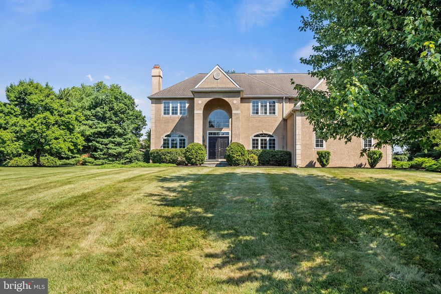 Situated on a picture-perfect cul-de-sac lot in Malvern’s premier Countryview Estates neighborhood, this tastefully upgraded French colonial boasts endless amenities inside and out. From the side driveway, a stone path leads to a soaring, two-story entry with elegant double doors and oversized arched window. Inside, the gracious foyer welcomes all with its high ceilings and abundant natural light. Just off the foyer sits a sun-drenched dining room with custom moldings and grand architectural window boasting scenic front-yard views. From the dining room, a butler’s pantry with white glass-front cabinetry leads to a sprawling eat-in kitchen with center island, double wall oven, granite countertops, newer stainless-steel appliances and oversize closet pantry. Additional amenities—including a built-in desk area with wine rack, a secondary stairway to the home’s upper level and French door access to the expansive rear terrace and yard—enhance the kitchen’s convenience and appeal. The sunny breakfast area spills into an open family room with recessed lighting, gas fireplace and lovely panoramas of the beautiful backyard. From the family room, French doors connect to a generously sized office. Just beyond sits a large living room with marble-tiled gas fireplace. A laundry room with utility sink, powder room and side mudroom with direct access to the three-car garage complete this spacious, well-designed first floor. Upstairs you’ll find a vast primary suite with sitting area and ensuite full bath featuring a Jacuzzi® tub and water closet. The suite also boasts his and her walk-in closets and a separate bonus room that could easily function as a home office or gym. Just down the hall sits three spacious bedrooms with large closets, two full bathrooms (one ensuite; one jack and jill) and another bonus room that could serve as a secondary study, cozy lounge or homework space. The lower level features a large open area with built-in bar that’s perfect for entertaining plus two oversized storage rooms that could easily be converted to additional living space. Outside, the home’s glorious, tree-lined backyard offers an enviable oasis complete with large slate patio, stone fireplace, custom retaining wall and nearly an acre of greenspace. Nestled in the heart of Tredyffrin Township and just minutes from Valley Forge National Park and the shops and restaurants of downtown Paoli, Malvern and Berwyn, this must-see Main Line home is zoned for top-rated T/E Schools. Propane gas, public water and sewer. Stucco report available upon request.
