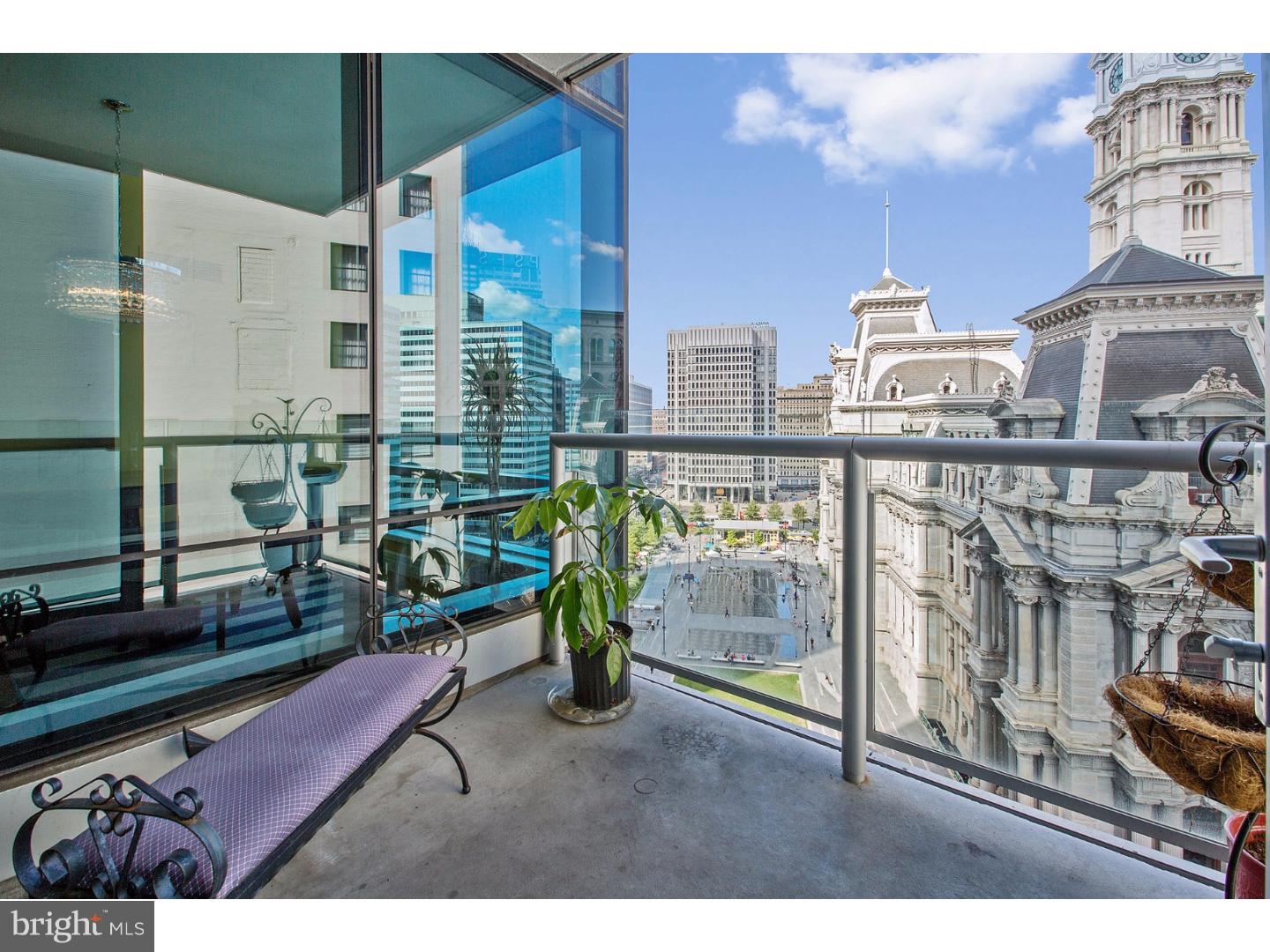 Incredible price improvement!! Enjoy brilliant light and breathtaking city views in this magnificent 2,100 SF condo located at the highly desired Residences at the Ritz Carlton, Philadelphia's most respected 24-hour doorman condominium, complete with your own private on-site parking space. Enter your luxury home in the sky, into your Living/Dining expanse bathed in natural sunlight from North/West/East exposures and featuring 12-foot floor to ceiling windows, gorgeous maple floors, highly sought after balcony overlooking City Hall, and a restaurant-quality chef's kitchen with center-island, German designed Dornbracht fixtures, Brazilian granite countertops, custom cabinetry, and top-of-the-line appliances including a spacious Sub-Zero refrigerator/freezer, professional grade Franke sink, 6-burner gas Viking range, high-end Miele wood-paneled dishwasher, and a U-Line temperature-controlled wine fridge. Beyond the entertaining space, a wide hallway leads to the private bedroom wing of this incredible home where you'll find 3 bedrooms and 3 and 1/2 bathrooms. Each of the sun-lit guest bedrooms are complete with floor to ceiling windows, custom fitted California Closets, and en-suite full bathrooms, featuring Spanish Crema Marfil marble floors and countertops, wood cabinets with brushed chrome fixtures, a Kohler tub / shower combination with a marble surround, and Duravit toilets. At the end of the hallway you'll find the serene Master Bedroom Suite, a sun-drenched sanctuary replete with two separate California Closet fitted walk-ins, and an en-suite bathroom boasting Italian Calacatta Gold marble floors and countertops, a bathing area featuring full-height marble walls, custom wood cabinets and brushed chrome fixtures, double vanities with large undermount sinks, a separate European-style frameless glass shower, a BainUltra soaking tub and a Duravit toilet. Additional amenities include a multi-zoned, 4-pipe HVAC, separate laundry room, half bathrooom, and abundant storage space throughout. Designed by Handel Architects (the Design Architect for the World Trade Center Memorial in NYC), The Residences' dedicated staff delivers legendary Ritz-Carlton 5-diamond service, complete with 24-hour concierge services, valet parking, chauffeur-driven Bentley, and much more. The Ultra Luxury amenities include a 7,000SF gym, indoor pool, hot tub, and lounge. This rarely offered 3 bedroom, 3.5 bathroom home is the only floorplan available with a balcony in the building.