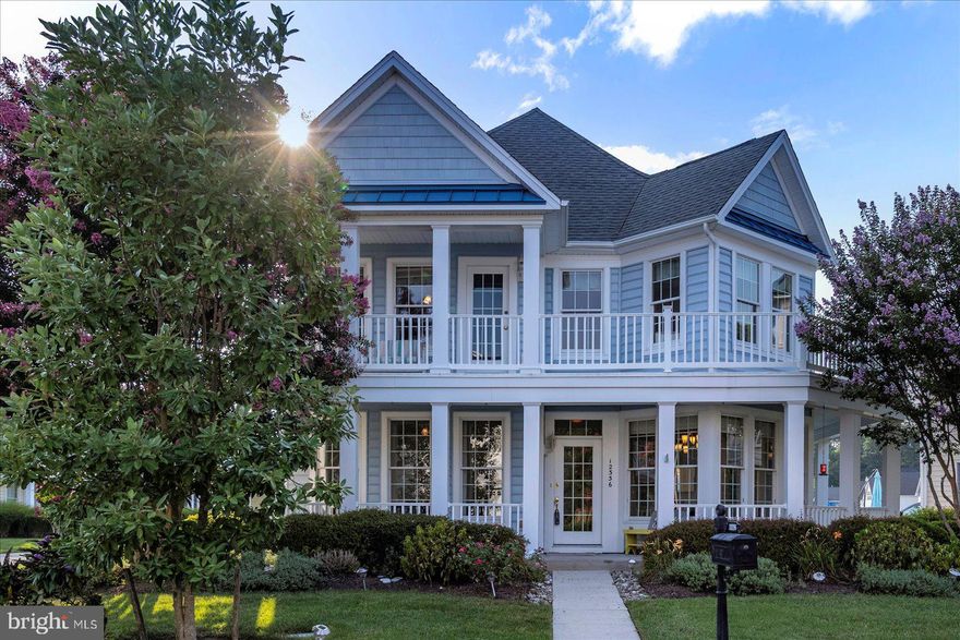 This beautifully maintained 3 Bedroom, 4.5 bath Toll Brothers home in the amenity-rich Bayside community is just waiting for the right buyer. Freshly painted with new second floor carpet and first floor luxury vinyl plank, it's move-in ready. An open floorpan, high ceilings, and gas fireplace create an inviting feeling when you first enter the home. The first floor has a study with french doors and a separate entrance, which could be an ideal office. The expansive primary bedroom features a luxurious en suite bathroom with a jetted tub and walk-in shower and a walk-in closet. In fact, all bedrooms feature an en suite bathroom. The third floor is perfectly designed for a home theater, and even has it's own bathroom! Outside there is a wrap-around balcony on the second floor, a porch on the first floor, and a roughly 800 square foot patio with a pergola and sunshade right next to the attached 2 car garage. Bayside has both an indoor and outdoor pool, tennis courts, a clubhouse, fitness center, kayak dock, separate crabbing pier, and a freshwater lake! Only a short drive to Assateague Island, Berlin, or West OC, this house is everything you want and more!