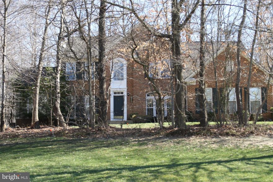 Financing Very Shaky! Looking for backup offer! Welcome Home! This large home with a 3 car garage sits on a quiet street and is located on a 2 acre wooded lot.  If you are looking for privacy this is your home.   Hardwood floors expand throughout the dramatic two-story foyer and first floor powder room.  First floor consists of an office,  sitting room, living room,  dining room, and spacious sunroom.   Large kitchen with center island that opens up to the family room , perfect for relaxing and entertaining.  Family room features dramatic  stone, gas fireplace and lots of  windows. Upstairs the Master bedroom has two large walk-in closets, sitting area, and a large tray ceiling.  Three additional bedrooms share a bath with double sinks.   The basement is enormous in this home and is partially finished with a home theater. There is a full underground sprinkler system on the property with automatic controls and sensors.  NO HOA!