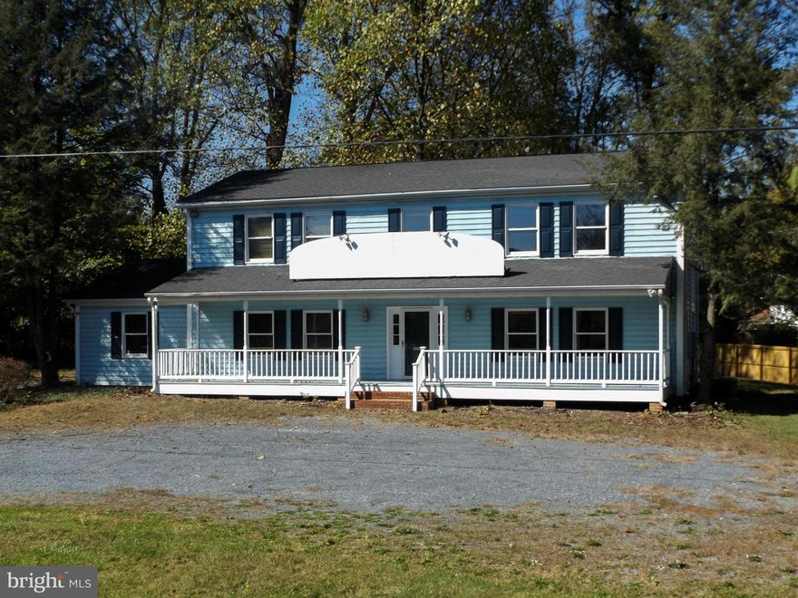 JUSR REDUCED! What a great investment this would be! Upper level has apartment/office space with kitchen, full bath and private entrance. Main level has lobby, individual office spaces, kitchen and bath. End office has own entrance.Full front porch and lots of parking space. Easy access and visibility to I81 Many possibilities come with this property! Square footage is approximate