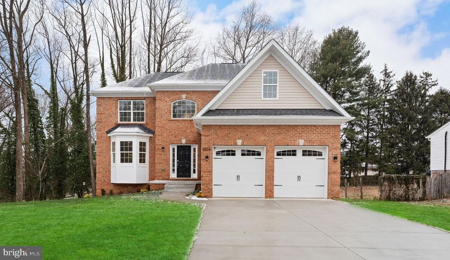 New Construction, with lots of upgrades to offer!!! Move in ready, available for immediate closing.

Welcome to the newest build in the well-desired Holmehurst community of Prince George’s County in Bowie, MD. This elegant single-family home sits on a beautifully graded lot at the end of a cul-de-sac that invites you into the front yard and offers a walk-out basement. Upon entrance, you are warmly greeted by luxury vinyl floors, with an open foyer that is decorated with a beautiful chandelier. Meticulous attention to detail is presented in the kitchen with the premium calacatta quartz countertops, marble blue pendant lights, two-tone (white and gray) color cabinets, and brand-name appliances. A comfy family room offers lots of sunlight and a 68” touchscreen electric fireplace that emits authentic-looking flames emulating a real fire. Multiple bay windows and lighting package add additional space and lights in breakfast, dining, and formal sitting areas making this house feel even more spacious. 2nd floor is welcomed with a beautiful hardwood staircase and handrails. Upstairs, traditional colonial layout with 4 spacious bedrooms, including an en-suite primary bedroom with tray ceiling, two walk-in closets, premium tiled full bath offering dual calacatta quartz vanity, corner soaking tub, and stand-up rain shower to fall in love with! Hallway has a full bath with premium tiles and calacatta quartz vanity. The fourth bedroom has additional space as a bonus room that can be utilized as an office/library/play area. Separate laundry room conveniently located upstairs off the hallway that includes a wash sink upgrade for convenience. Downstairs the walk-out basement is fully finished (except for the mechanical room) with an enormous family/recreational area with an extra full bath with premium tiles and calacatta quartz vanity. Additionally, 3 lower-level windows upgrade provides plenty of daylight. The Brick front with exterior lighting, vinyl siding, and a 2-car garage attached with a nice wide and long concrete driveway provides ample parking. The wooded backyard provides privacy for residents. Great location near Route 50, 450, and 495 beltway. Near NASA, Six Flags America and shopping at the Bowie Town Center.