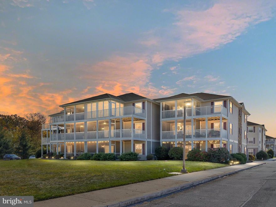 Enjoy the comfort and convenience of single-level living in this updated 2-bedroom, 2-bath condo located in the highly sought-after Congressional Village community of Middletown. The thoughtfully landscaped grounds provide a warm welcome as you arrive.
Take the elevator or stairs to Unit 5302, where an open-concept dining and living area features new engineered hardwood floors and an abundance of natural light. Just off the living room, the inviting three-season sunroom offers the perfect spot to savor your morning coffee while taking in the sights and sounds of nature. Step outside onto the deck—ideal for cultivating flowers or herbs—while enjoying peaceful views of the 9th hole at Frog Hollow Golf Course.
The primary suite features brand-new windows (2025), an en suite bath with newer tile flooring, a double-sink vanity, shower, and a new ADA-compliant toilet (2021). The second bedroom, located on the opposite side of the unit for added privacy, also includes new windows. The hall bath has been refreshed with new flooring and another ADA toilet.
A hallway with newer hardwood floors leads to the spacious kitchen, where your culinary skills will shine. Here you’ll find newer flooring, a Samsung glass-top range (2020), microwave (2020), GE refrigerator  (2023), and dishwasher (2021). The breakfast bar and double sink add everyday functionality.
Additional updates provide peace of mind, including a new HVAC system (2020), a 50-gallon water heater, and a stacked washer and dryer (2020). With close proximity to DE-1, DE-13, and DE-71, this home offers comfort, convenience, and connection to everything Middletown has to offer.
Note:  Select interior photos have been virtually staged