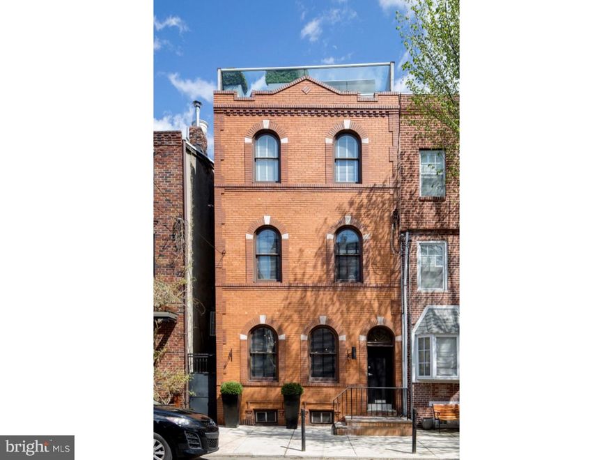 Stunning 4 bedroom plus den and huge finished lower level, 3.5 bath townhome on a premier tree-lined Bella Vista/Queen Village block in the Meredith Catchment.  2-CAR PARKING.  Large patio with local limestone pavers and an amazing roof deck with spectacular 360 degree views, sitting and dining area, and a hot tub.  This home is situated on 2 wide lots (street to street).  It is a complete 2011 renovation down to the studs with a Tax Abatement through 2021.  Everything new throughout (including energy efficient systems, roof, custom windows, flooring, luxury finishes?just everything).  Contemporary, high-end custom renovation - done by the renowned architect and design team of David Amburn and Jerry Jarosinski.  High ceilings, spectacular light, the most tasteful custom work throughout.  Open floor plan; wide-plank hardwood floors; Large living area, open to dining area and beautiful kitchen with Viking appliances, Lagos Azul tops and an island with rare 6 inch thick marble salvaged from Independence Mall.  Custom Cabinetry throughout.  Beautiful bathrooms.  Amazing lower level/family room/home theater.  3 separate outdoor spaces.  Custom-smithed steel work.  In the MEREDITH School Catchment.  Niles sound system throughout.  2-zone high efficiency HVAC.  Ample closets and storage.  Energy efficient replacement windows throughout, including custom windows on the entire dramatic facade.  Everything was considered in this design of this home.  And all of this in an ideal location.  A lovely, tree-lined residential block; the desirable Meredith School Catchment, and a 99 WalkScore- so close to everything Bella Vista, Queen Village, Wash West, South Street, East Passyunk, and all of Center City have to offer.  NOTE--This homes sits on a double lot that includes 769 S. 6th and 754-56 S. Randolph.  The lot size and taxes listed are for both of these lots combined and both are included in the sale.  Also, the Randolph lot frontage is 23 feet.