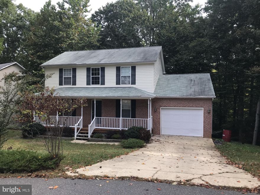 TOUR IT yourself!! GO too Rently.com. White Sands subdivision!! brick front colonial house. Peaceful, park like setting, to sit and watch mother nature from the beautiful front porch! Three large bedrooms! Lots of space for storage in the basement, Paved drive.