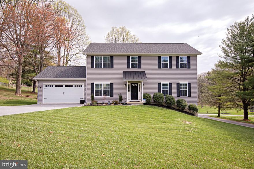 Welcome to 1467 Federal Drive in the community of Colonial Woods.  This picture-perfect home offers all the space you need and modern amenities you will love.  Highlights include a bright & open floor plan with recessed lighting and luxury laminate plank flooring, a beautifully updated kitchen and baths, 4 generously-sized bedrooms, a full walkout basement, an oversized deck with a lovely view, and crisp white paint throughout for a blank canvas to add your touch. All of this, sitting on just under a half-acre in the Downingtown West School District. Step inside to the bright two-story foyer and gorgeous floors which extend into the formal living room & dining room on either side.  Flow into the ideal open living space joining the kitchen, dining area, and family room, with a soothing view outdoors from each space.  This kitchen has lovely white cabinetry, granite countertops, stainless steel appliances, counter bar seating, another adjoining dining space, and it opens to the family room with cozy gas fireplace in the center of it all.  From the main living space, extend your living, dining, relaxing, and entertaining outside to the large composite deck with a panoramic view of nature; the ideal place for enjoying time with family and friends.  Back inside and completing the main level is a powder room for guests and the laundry. Luxury plank flooring extends upstairs to the oversized landing and to all 4 bedrooms, including the primary suite with double closets and large en-suite bath with dual vanities. An additional 3 bedrooms and another full bath complete this level. Get excited about the fabulous lower level of this home that has been insulated, studded, and is waiting for your imagination.   With 9-foot ceilings and sliding glass doors leading out to the backyard, this can be your dream entertaining space.  Garage includes electric car charger if needed. Close to major routes for commuting, and everything this area has to offer.  Be sure to schedule a showing today!