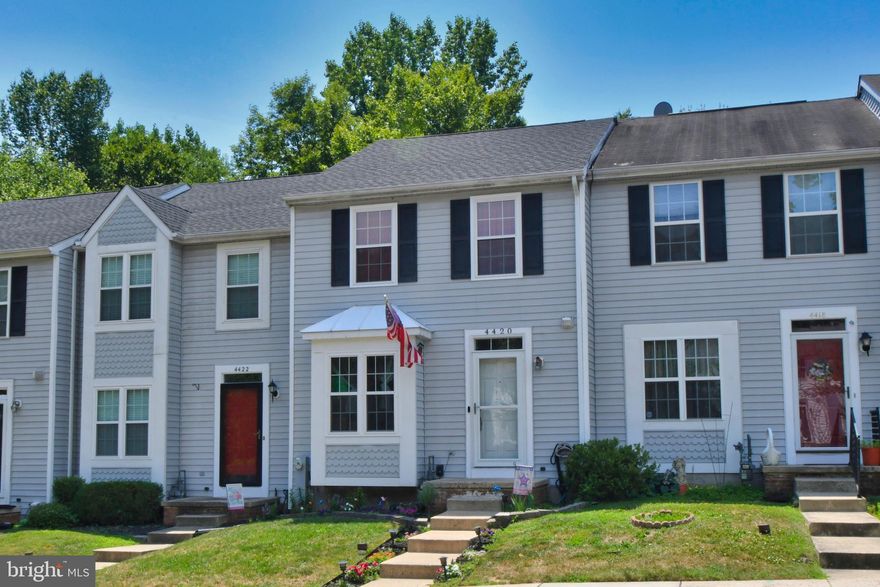 Great town home with new roof, new windows, new doors, new HVAC system, new hot water heater and more  Beautiful hardwood floors in the spacious living room. Kitchen with center island, plenty of counter space and eating area. The rear fist floor family room has cathedral ceilings and a new french door to the new deck over looking the woods. Upper level has three bedrooms. Lower level walk out is finished and open up to a rear patio. Lower level has full bath also.  Located on a quiet court location and backs to woods  Make your appointment today Showings begin on Thursday, Sept. 10th at 10am. MULTIPLE OFFERS. SELLERS ARE TEMP OFF MARKET AND MAKING A DECISION.