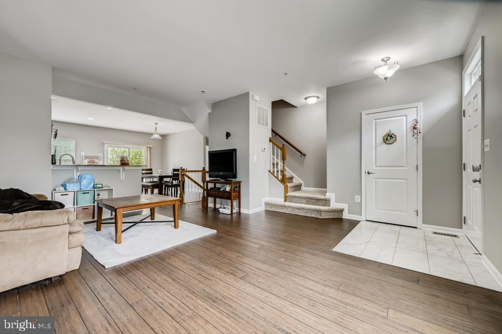 ***MULTIPLE OFFERS – ALL OFFERS DUE SUNDAY @ NOON***Welcome to Paragon Court! This stunning town home is located in the heart of Owings Mills and convenient to shopping, restaurants and transportation. Featuring 3 bedrooms, 2.5 bathrooms and OVER 2100 sqft of living area, this turnkey home is totally move-in ready and waiting for a new Buyer! With stranded bamboo flooring, new carpet, fresh paint and recessed lighting throughout, this home is a no brainer! Fully finished lower level with half bath and storage leads to private walk out back yard. Owners’ suite with walk in closet, on-suite bathroom with soaking tub and 2nd floor laundry. Bring your bags and unpack today! Low HOA fees!