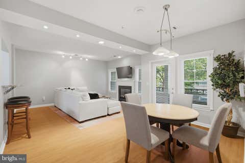 Photo of 12016 Taliesin Place #25, RESTON, VA 20190 (MLS # VAFX2334878)