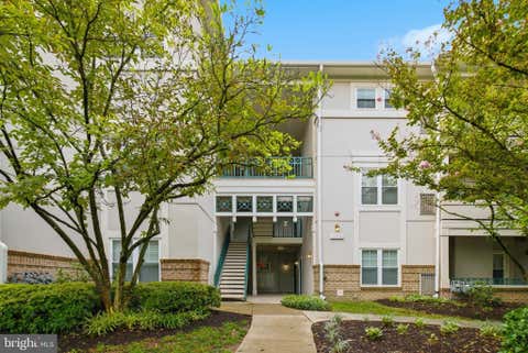 Photo of 12016 Taliesin Place #25, RESTON, VA 20190 (MLS # VAFX2334878)