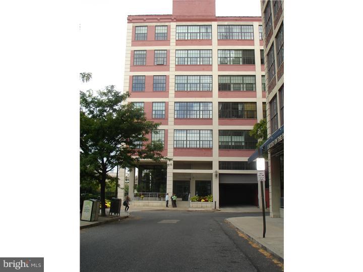 Locust Point is a luxury, mid-rise condominium which boasts being the recipient of 8 building industry awards, including "Community of the Year". This loft-style unit had been one of the builder's models with an upgraded lighting package and ceiling fan. The open living room features soaring ceiling, exposed ductwork and beautiful Brazilian cherry hardwood flooring. Enjoy your rooftop view of 30th Street Station, Cira Center, The Murano and all points north through two huge windows. This open floor plan allows full view of the upgraded kitchen with granite counter tops, GE stainless steel appliances, custom under-cabinet lighting, custom lighting fixtures and full breakfast bar, complete with four stools. The raised bedroom accommodates a full bedroom suite with wall-to-wall carpeting, mirrored closet doors and custom closet inserts. There is a full size washer and dryer in the luxury marble bath. The building offers separate storage lockers, on-site fitness center, outdoor resident patio and free wi-fi in lobby. Plus, it is PET FRIENDLY. This building is ideally located in Fitler Square, just steps from the Schuylkill River Walking and Bike Path, fabulous dog park, Universit City, Rittenhouse Square and major highways.