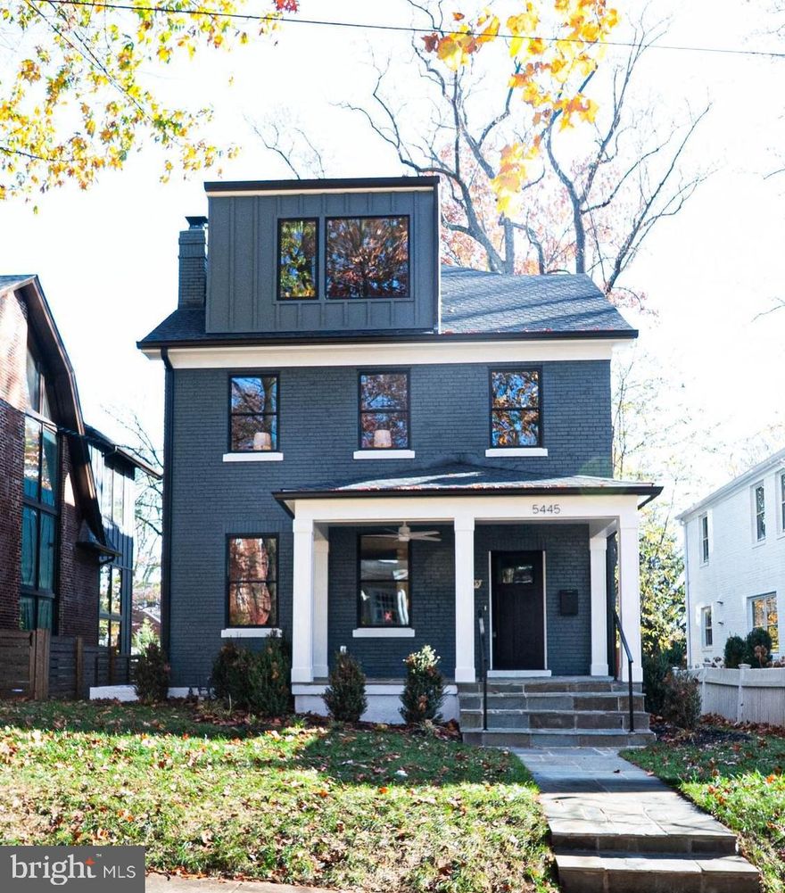 Reimagined, expanded, and masterfully redesigned, this exceptional new construction in Chevy Chase, DC, seamlessly blends timeless Colonial charm with clean, modern sophistication. Curated by JDM Design Studio, the interiors strike a perfect balance between classic elegance and contemporary comfort, ideal for today's lifestyle.

The main level welcomes you with beautifully finished wood floors and a thoughtfully designed layout, featuring a comfortable formal living room, an elegant dining room, a butler's pantry, a whimsical powder room, and a spacious walk-in pantry. A charming side entry hall enhances the flow and functionality of the space. The heart of the home is a stunning gourmet kitchen outfitted with high-end appliances and designer finishes, opening seamlessly to a large family room. Sliding doors lead to a large rear deck overlooking a fenced backyard and a 12' x 20' off-street parking pad, pre-wired for an EV charger.

Upstairs, the second level offers three generously sized bedrooms and three full bathrooms, including a luxurious primary suite with a spa-like bathroom and two expansive walk-in closets. A dual-entry laundry room adds everyday convenience.

The third-level loft is a true showpiece, featuring 14-foot ceilings, a spacious second family or media room, two additional bedrooms, two full bathrooms, and a covered rooftop deck with a wood-paneled ceiling, perfect for relaxing or entertaining while enjoying sweeping rooftop and treetop views.

The walk-out lower level provides even more flexible living space, complete with a full bedroom, 1.5 bathrooms, a large recreation room, a second laundry area, and a mudroom with direct access to the backyard and parking pad.

Ideally located just five blocks from the shops, dining, and amenities of Connecticut Avenue, and only three blocks from Lafayette Elementary and Broad Branch Market, this beautifully crafted home offers refined design, generous space, and an unbeatable location in one of DC's most desirable neighborhoods.