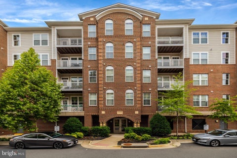 Photo of 13724 Neil Armstrong Avenue #404, HERNDON, VA 20171 (MLS # VAFX2322904)