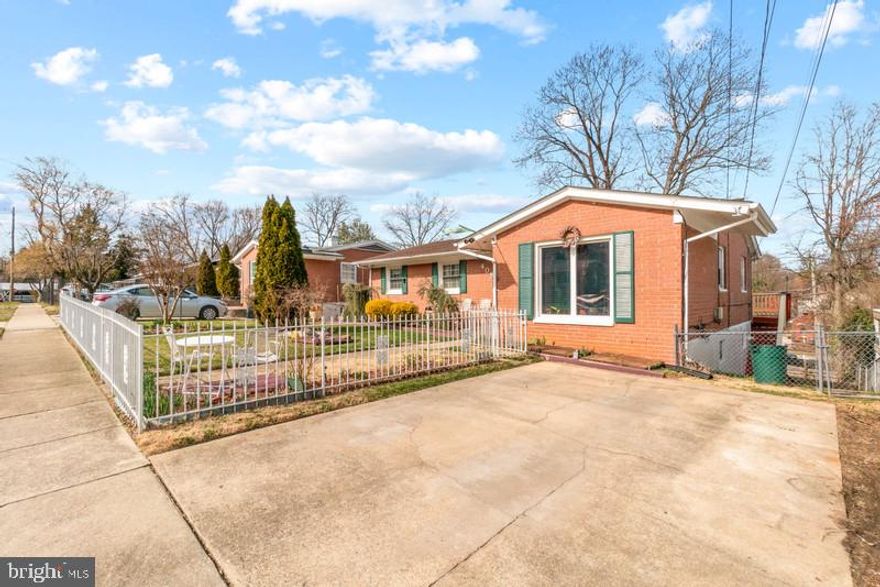 Offers will be accepted through Wednesday, March 20, 2024 at 2:00 pm.

AT SELLER'S DISCRETION, AN OFFER MAY BE ACCEPTED AT ANY TIME.

Welcome to 408 Hayworth Pl., a warm and inviting sanctuary nestled in the heart of the Maryland area, just a stone's throw away from Virginia and a short drive to the bustling streets of DC. Conveniently situated within walking distance to the enchanting National Harbor  and the vibrant Tanger outlets, this home offers the perfect blend of convenience and charm.

Let's delve into the details:

Primary Structure:

Built in 1957, this timeless home boasts a captivating charm that stands the test of time.
Above Grade Living Area spans an impressive 1,309 SF, providing ample space for comfortable living.
Finished Basement Area adds versatility and functionality to the home's layout.
Property Land Area encompasses 6,226 SF of lush surroundings, perfect for outdoor enjoyment.

Exterior:

Wrapped in all brick exterior, this residence exudes timeless elegance and enduring quality.
Step outside to a full-length deck offering breathtaking views of the neighborhood, with the iconic MGM casino gracing the landscape.

Interior:

Upon entering through the wrought iron white fence, you'll be greeted by an expansive garden, blooming with life throughout the spring and summer.
The interior boasts a new roof and newly installed windows and furnace heating and cooling system in 2022, ensuring modern comfort and peace of mind.
Inside, hardwood floors and exquisite gold trim chandeliers create an inviting ambiance that welcomes you home.

The spacious living and dining areas provide the perfect setting for gatherings with loved ones.
The kitchen seamlessly connects to the outdoor deck, offering an ideal space for al fresco dining and entertaining.

Bedrooms and Bathrooms:

With four bedrooms and two full bathrooms, including a master suite with modern amenities, this home offers comfort and convenience for every member of the family.
A retro pink-tiled bathroom adds a touch of nostalgia and charm to the home's character.

Basement:

Descend into the basement to discover a sprawling entertainment area complete with a full bar and brick accent wall, perfect for hosting memorable gatherings.
Additional storage space and laundry facilities add functionality to the lower level.

Exterior:

The backyard, complete with a fence for added privacy, offers a serene retreat for relaxation and outdoor enjoyment.
In summary, 408 Hayworth Pl. is more than just a house; it's a sanctuary where cherished memories are made and dreams are realized. Don't miss the opportunity to make this jewel of a home yours. Welcome home.