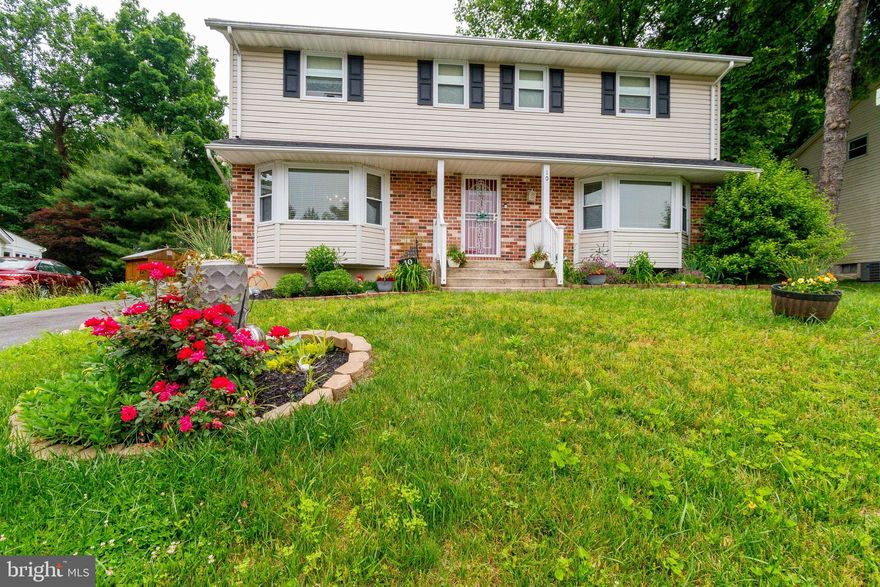 NEW PRICE!!! BACK ON THE MARKET due to previous buyer financing.     Be a part of the prestigious Kings Park Estates community this summer! This colonial, with an oversized living room, formal dining room, eat-in kitchen with a new stainless steel stove and new quartz countertops, and a first-floor family room ...ready for its new owners.  Boasting 4 upper-level bedrooms, with a bonus room on the lower level, a huge primary bedroom with an en suite bathroom, hardwood abounds in this home.  Lower level rec room, exercise room, and walk up to a spacious backyard. 2021 Roof!!!  1-year Home Warranty to Buyer!
Enjoy eating crabs and sipping your favorite beverage on the screened-in porch while you enjoy your private backyard.  Driveway for 3  cars.  
Lots of shopping and entertainment options nearby with Foundry Row, Mill Station, & Metro Center at the top of your list.  Quick drive to I-795 & I-695.