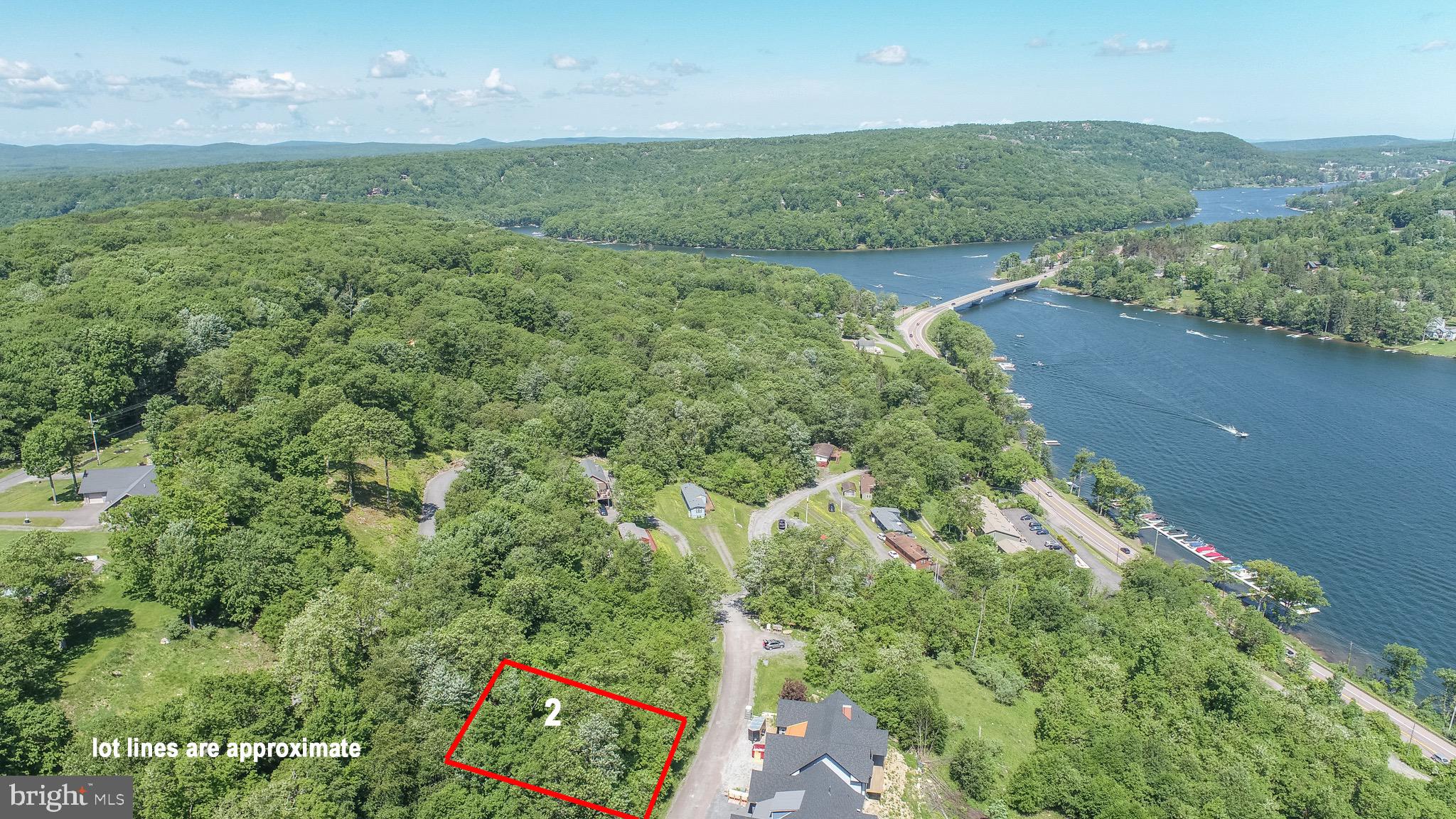 Enjoy the best the lake has to offer from 'Overlook Ridge'! Boasting year-round lake views, yet tucked away in a peaceful and serene community setting. Short drive to the community lake access area for swimming and fishing! Dock Slips may be leased through HOA. Utilities to site and ready to build your perfect four-season Deep Creek getaway. Located just off of Rt. 219, with easy access to all area amenities, including local establishments, state parks, and Wisp Resort. Don’t miss your chance to buy and build your dream home right in the heart of Deep Creek Lake. Call today for details!