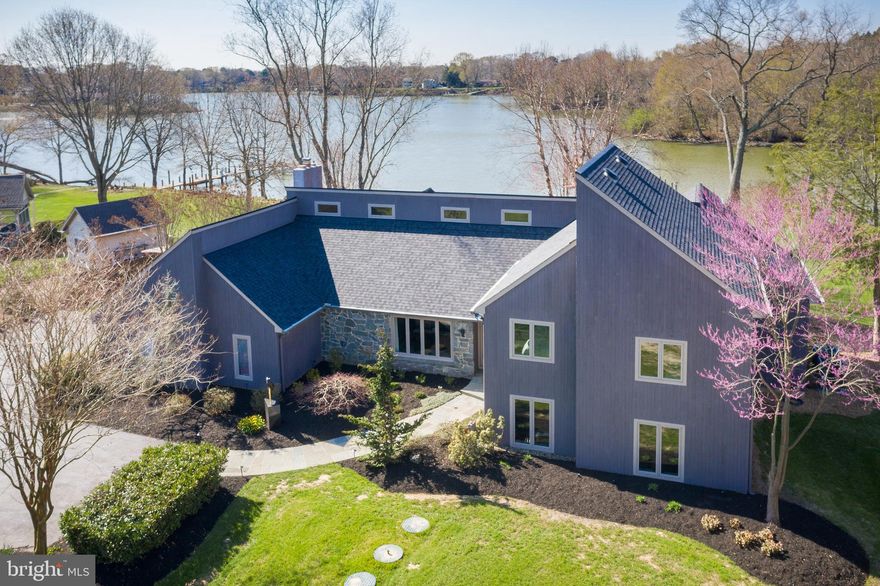 Breathtaking waterfront on the Wye River!
Panoramic water views from this completely updated contemporary home!
As you meander down the treelined driveway of this 1.7-acre property you will be struck by the beautiful landscaping and enchanted by the sounds of nature. Privacy grows as your approach the home, and views of the iconic Wye River come into focus. This is just the beginning of this storybook home.   
Inside the property you’ll be greeted in a lovely well-lit foyer. Off to the left on the main level you will discover a large family room with vaulted ceilings, a stone fireplace, and water views. A great space to gather as it is adjacent to the fully updated gourmet kitchen with stone and stainless beautifully complimenting the space. If you head downstairs, you’ll find a generous space currently used a 2nd family room, as well as a dedicated workout area and a half bath. From the main entry as you go up a half level, you’ll enter a remarkable primary bedroom and bath. Elevate another few steps to find 3 spacious additional bedrooms and full bath. Views through the home are gorgeous, and with the southwesterly exposure the sunsets are like icing on the cake! 
There are many updates including Pella windows (2015), a BAT nitrogen septic system with 4-bedroom capacity (2021), two heat pumps (2018), timber tech and screened porch (2017), 40 year architectural shingles (2020), renovated kitchen (2020), new carpet, finished hardwood floors, renovated bathrooms and much more!
The fun doesn’t stop there because the grounds of this property are beautiful! The gardens are professionally landscaped, there is a private boat launch/ramp, private pier, and a 12.5K boat lift. While at the property you’ll feel the beauty of a private, quiet and secluded location but you’ll also find that it’s convenient to the bay bridge, shopping of all kinds, & close to Bennet point store. Don’t miss this opportunity to live on the Wye within the walls of this stunning home.