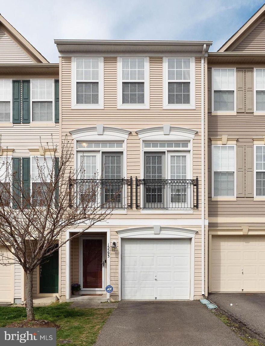 Welcome Spring in style in this amazing former model home that's in immaculate condition!  You'll enjoy a lifestyle of ultimate convenience to I-95, VRE, Stonebridge at Potomac Town Center, shopping, dining and recreation. This Powells Run Village community home offers 3 beautifully finished levels with the sought-after interior and exterior features for your enjoyment.  Start with a welcoming ceramic-tiled entry with easy access to the ground level bedroom that has a private bath and access to the rear yard space.  The sunny main level is an open layout filled with gleaming hardwood floors; elegant dining and living rooms; half bath; and a stunning eat-in kitchen design with granite counters, portable center island, GE stainless steel appliances, and walk-out to a sizable deck perfect for summertime grilling and entertaining.  Retreat to the upper level with a spacious master suite with a private full bath, and another sizable bedroom with a private full bath.  All lawn care and trash service included in HOA.  Additional pleasures: Spectacular community views; Ecobee thermostat; Nest doorbell; shelving in garage; alarm system; guest parking in the neighborhood; and community pool, clubhouse, gym and tot lot.  More to see and experience.  You'll be proud to call this "Home".