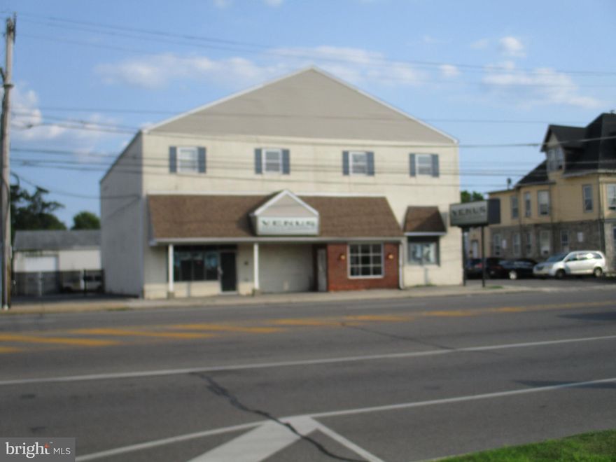 Exceptional opportunity!!  Highly visible Commercial building in exceptional condition, with over 9000 square feet.  80% shop area and 10% office space and 10% other(4 Bathrooms and closet space.) 
2 Zone Rudd gas Heating system, Central Air and a 3 phase electrical system, a hardwired Security System,
and a new roof in 2017.