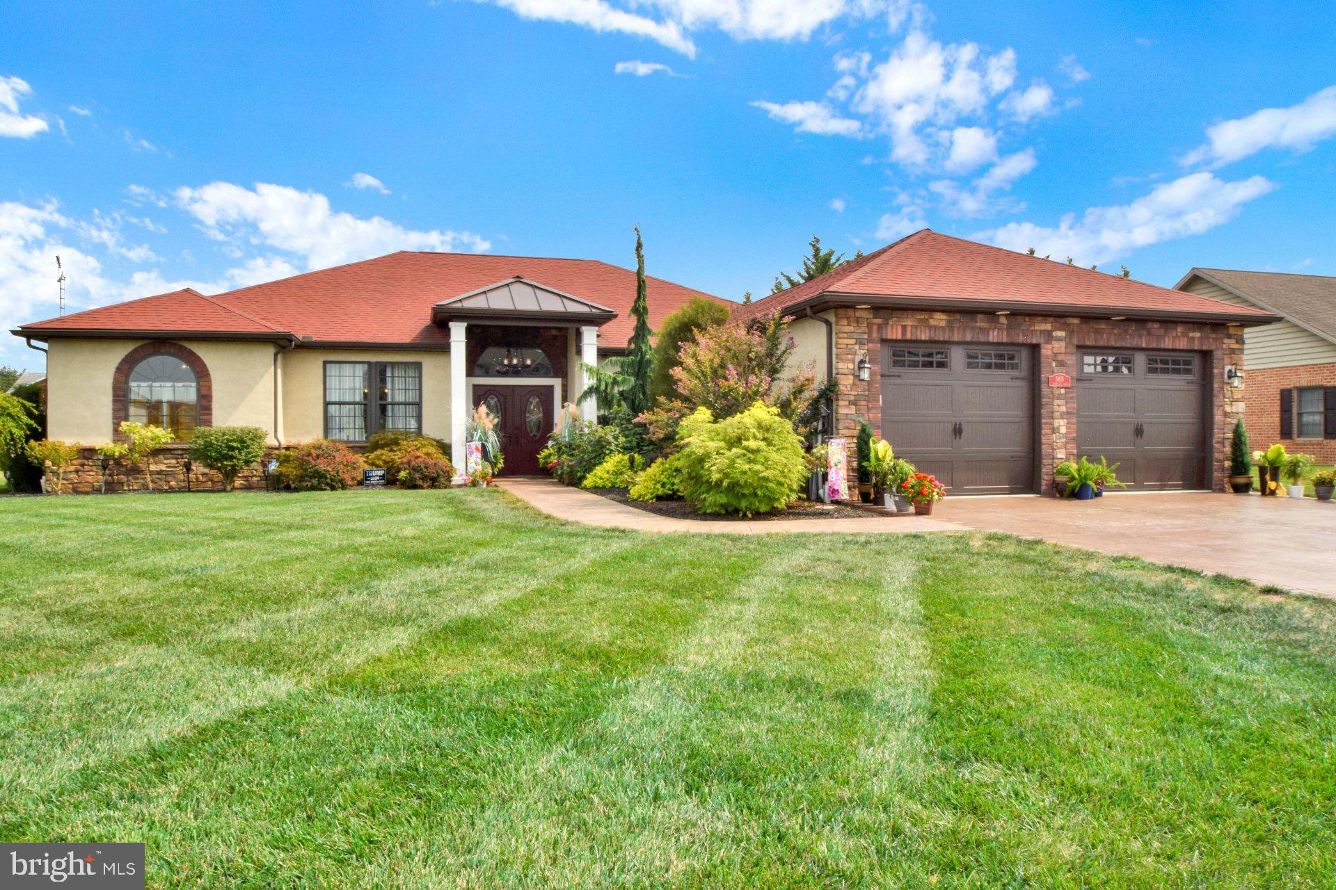 Paradise in Franklin County! Come see this incredible Spanish style Floridian ranch home in Greenvillage! Just pulling into the driveway you will have an idea of the quality you are about to experience. Stamped concrete driveway is flat and wide. Easy to maintain landscaping compliments the walkway to the front porch/foyer. Double doors and a classic chandelier lead you in to this open concept ranch home. No detail has been overlooked from the wonderful flooring to the tray ceiling in Living Room. Perfect dining room space right of the main entry and kitchen a few steps from that. Custom cabinetry and gun metal appliances make this kitchen special and the envy of any cook! It even has a dedicated pantry that leads to laundry room and garage. The garage is clean and oversized with plenty of room for shelving or a workbench. Traveling back inside we have a big master bedroom with attached master bath. I can't say enough about the tile work and quality in both of these bathrooms. Walk-in closet and separate tub compliment the large bathroom space. 2 bedrooms on the other side of house with another beautiful tile shower/bathroom. Let's go outside because it might just be your next tropical escape. My breath was taken away with the level of care and meticulous thought that was put into the outside area. When you step out of the house the stamped concrete path calls you to the dreamy pergola in the back. Spend countless hours reading or napping in this perfect space. Like to entertain? Then move the party 10ft and enjoy your paver fire pit/circle complete with lights. There is even a small water feature. If that wasn't enough to wet your lips, the hot tub stays! I can't stress enough to get your showings in. This one is special!