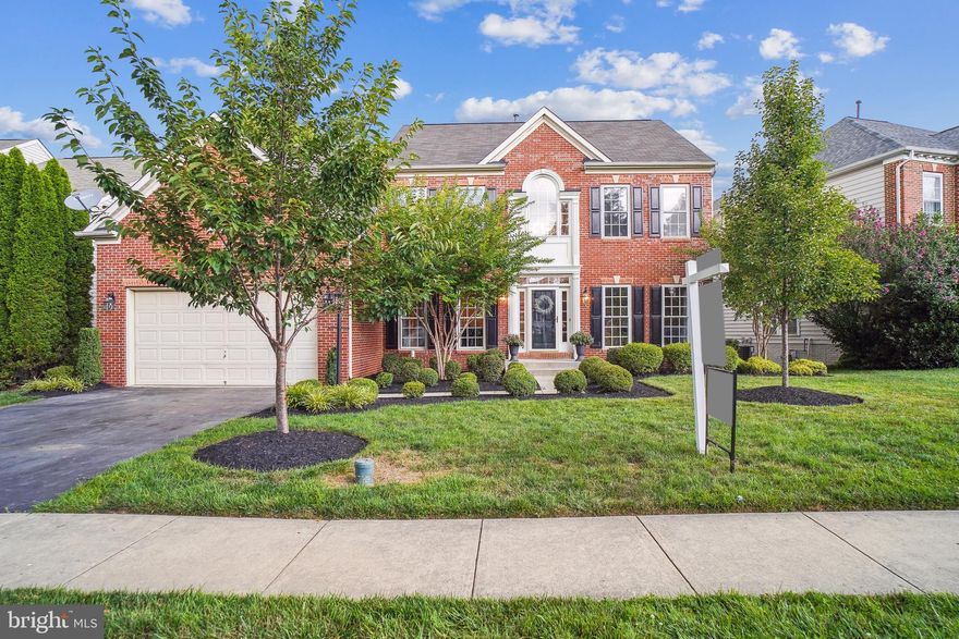 Amazing home on a gorgeous private lot backing to trees in a prime Urbana location with top notch schools within walking distance to community pool, tennis courts, basketball court, parks, nature walking and bike paths. This Remington single family model boasts a story-foyer and 2 story family room, BRAND NEW hardwood floors on 1st floor, 2 floor hardwoods, fresh paint throughout, upgraded lighting. The over-sized kitchen features quartz countertops, breakfast bar, island, and morning room that leads custom 2-level Trex deck with exterior staircase overlooking your WOODED backyard with flat lot! Take a quick stroll a few feet away to access all nature offers with a walkable path through the woods with charming bridge crossing the small creek or venture out on the larger walking and bike riding trails that connect to shopping and parks. The finished walkout basement with large windows and French doors features wet bar, recreation area and home theatre and large storage room. This walkable community boasts a pool, basketball court, tennis courts, parks, walking trails, a shopping center, restaurants, and library and YMCA.