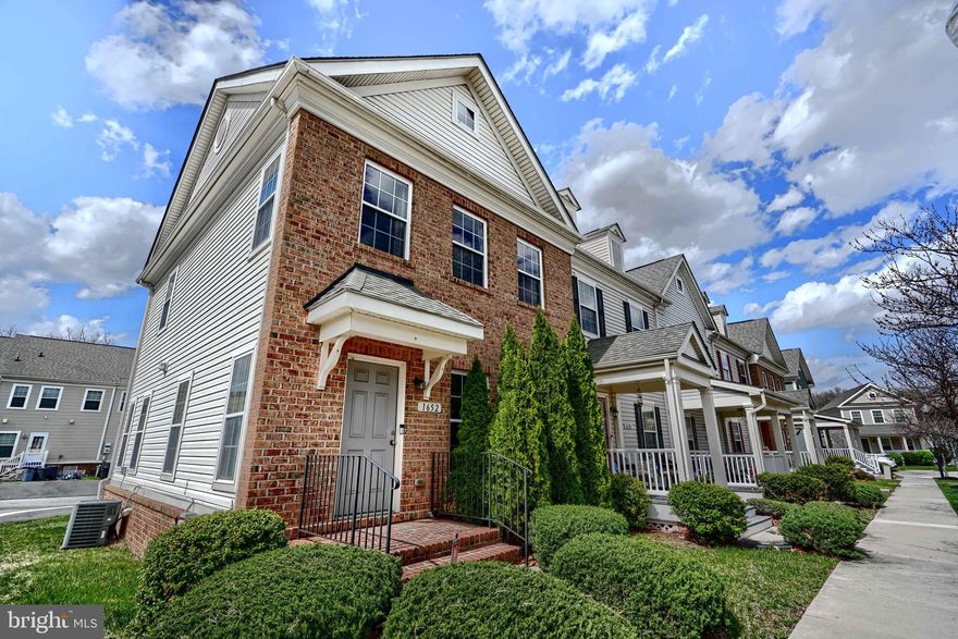 Welcome to 1652 Evergreen Way, a spacious end-of-group 4bd/3.5ba townhome with a garage in Essex! Offering a sprawling floorplan and ample sized rooms. The main level has a spacious living room with updated flooring that flows to the large kitchen. The kitchen provides large cabinets and tons of prep space and includes a tile backsplash and island. The main level also offers a powder room for convenience. Upstairs offers two guest bedrooms with large closets and a shared guest bathroom. The primary suite provides a large footprint, spacious closet and ensuite bathroom! The home is completed with a finished basement, which includes a rec room, bonus bedroom and third bathroom. Stop in today before it's gone!