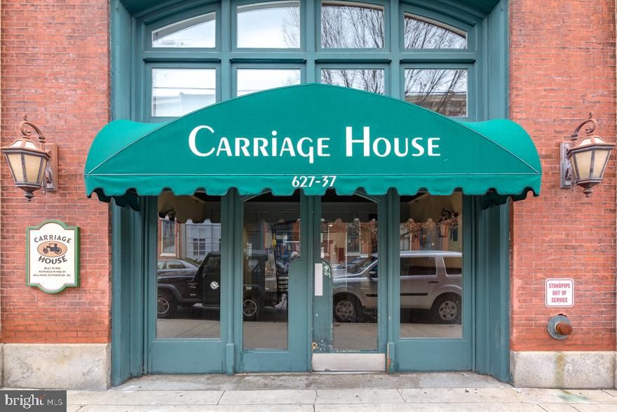 Welcome to Carriage House—one of Fairmount’s most distinctive and sought-after condominium communities.

This one-bedroom, one-bath residence offers a well-designed layout with hardwood floors throughout and a bright, open living and dining area. Large windows bring in excellent natural light and overlook the building’s signature interior courtyard.

The kitchen features granite countertops, stainless steel appliances, ample cabinetry, and a breakfast bar that opens to the main living space—ideal for both everyday living and entertaining. The spacious bedroom offers generous closet storage, while the full bath is clean and functional.

Additional highlights include in-unit washer and dryer, central air, and a separately assigned parking space, a rare and valuable feature in this location.

The Carriage House is known for its dramatic European-style central atrium with skylights and fountain, creating a unique and welcoming environment. The condo fee includes common area maintenance, exterior building maintenance, water, sewer, trash, snow removal, and professional management.

Located just steps from Fairmount Avenue, this home offers immediate access to neighborhood restaurants, cafes, the Art Museum, Kelly Drive, the Schuylkill River Trail, and Center City, with convenient access to major routes and public transportation.

A well-located and practical opportunity to own in one of Philadelphia’s most desirable neighborhoods.