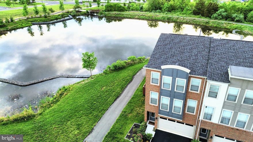 🏡 Available for Immediate Move-In | 

Don’t miss out on this incredible opportunity—enjoy picturesque pond views from your own backyard!

Welcome to Gateway Commons in Stone Ridge, Loudoun County, VA, a thoughtfully designed master-planned community that offers a perfect blend of vibrancy and tranquility.

This beautifully maintained North East-facing Essex model end-unit townhouse by award-winning Van Metre Homes is a rare find, offering exceptional privacy with a serene pond-facing lot. Boasting over 2,600 sq. ft. of stylish living space, this 3-bedroom, 3.5-bath home includes a 2-car garage and high-end finishes throughout.

🏠 Property Highlights:
Brick-front, three-level layout

Spacious lower-level recreation room with walk-out access to the backyard

Main level featuring a formal dining room, cozy living room with fireplace, and gourmet kitchen with stainless steel appliances, upgraded cabinetry, and breakfast nook leading to a custom deck with water views

Luxurious primary suite with tray ceiling, walk-in closet, and ensuite bath with dual vanities

Two additional spacious bedrooms, linen closet, and convenient upper-level laundry room

Hardwood floors throughout, CAT 7 wiring for high-speed connectivity

🏘️ Community Amenities:
Access to pools, clubhouse, tennis courts, fitness center, and walking trails

Proximity to Stone Ridge Village Center, Aldie Shopping Center, Dulles Landing, Stone Springs Hospital, and more

Located in a top-rated school district

Easy commute with access to Routes 50 & 28 and under 20 minutes to Dulles Airport

Onsite schools and daycare centers

📌 Additional Info:
Owner-occupied — showings by confirmed appointment only

Immediate move-in available

6-month and 9-month lease terms available

🔒 Rental Requirements:
Credit Score: 700+

Income: At least 2.5x monthly rent

No history of bankruptcy or evictions

📞 Schedule your private showing today—this home won’t last!