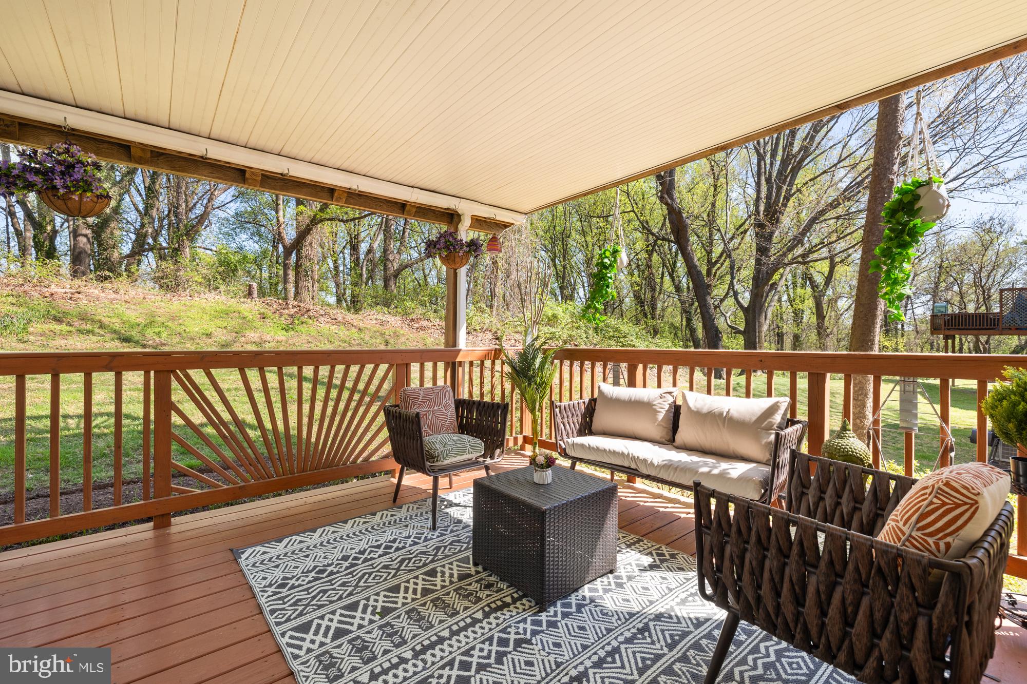 Offer deadline is 3 PM on Tuesday, April 15th. Thank you.
Tucked into the peaceful Sumner Clusters community and backing to the serene Little Falls Stream Valley Park and the Capital Crescent Trail, this rare one-level condo offers a private, nature-filled retreat with unbeatable access to Downtown Bethesda and DC.
Inside, you're welcomed by a bright, inviting family room with a cozy wood-burning fireplace—perfect for chilly evenings. The open-concept layout flows effortlessly from the living area to the dining room and kitchen, creating an ideal space for everyday living and entertaining. The kitchen is a true standout, featuring stainless steel appliances, granite countertops, soft-close drawers, a pantry, and plenty of storage to handle all your culinary adventures.
All on one level, the home features three spacious bedrooms, one full bath, a convenient half bath, and in-unit laundry—all designed for comfortable, easy living. Closet space is generous throughout.
Love the outdoors? Step out to your private, covered deck—perfect for morning coffee or evening wind-downs—with a paved patio just below for grilling or gathering.
With recent updates including a new water heater (2020), a new roof with 30-year warranty (2020), and a renovated kitchen (2018), this home is move-in ready. Plus, there's plenty of parking and an EV charger installation is an option.
