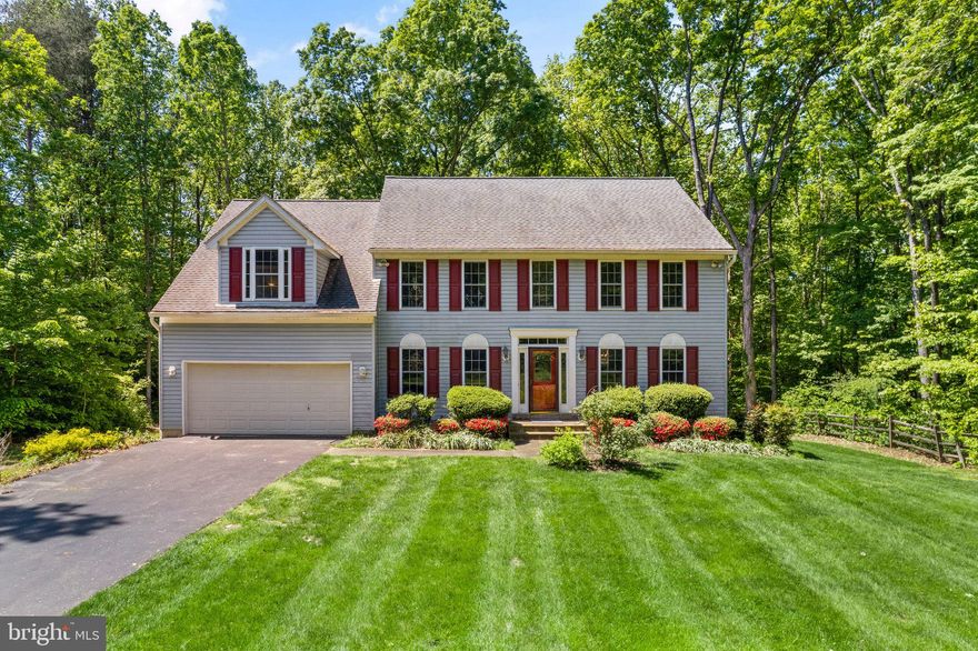 This spacious 4177 sq ft residence sits on a sprawling 1-acre lot, offering endless potential for customization. With a generous layout, each oversized room seamlessly flows into the next, creating a harmonious living space.  Enjoy the convenience of an extra parking pad in front of the 2-car garage and a vast backyard with ample room for outdoor activities. Upstairs, find 4 bedrooms, 1 Basement Room & 3.5 bathrooms, and a separate office on the main level. Entertain guests in the elegant formal living and dining rooms, or gather in the expansive eat-in kitchen with a sizable island.  Relax in the cozy family room, which opens to a deck overlooking the expansive backyard. The upstairs boasts an enormous primary suite with a huge walk-in closet and a luxurious bathroom with a separate shower and soaking tub. An additional spacious bedroom offers flexibility to create two separate rooms or a second master suite.  2 Car Garage, Huge Laundry w/ Laundry Shoot from the Top Flr.  The finished walkout lower level features a rec room (including a pool table & accessories), a bedroom, and a full bathroom. Located in the sought-after Prince William County school pyramid (Marshall ES, Benton MS, Colgan HS), and with easy access to I95, I66, commuter lots, and VRE, this home offers both luxury and convenience. Don't miss out—schedule a tour 
today! Sold as-is.  Pool table and accessories convey.