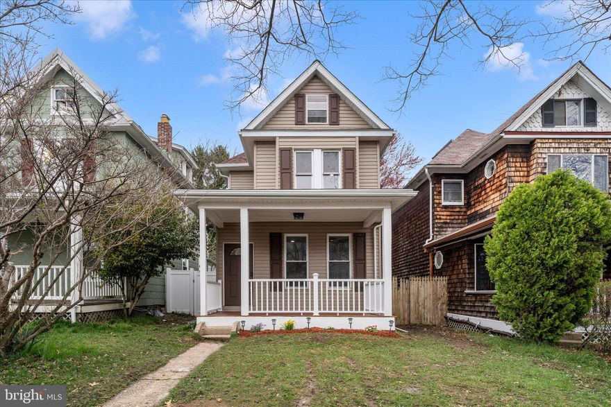Charming circa 1900 Waverly farmhouse with timeless character and endless potential! This detached 2-bedroom, 2-bath home features original wood floors, period details, and a stainless steel exterior chimney ready for your woodstove. Thoughtfully updated to blend historic charm with modern convenience. The spacious yard is perfect for gardening, entertaining, or play. Nestled on a quiet, tree-lined street just steps from the YMCA and minutes to Waverly Market, Lake Montebello, and neighborhood shops and cafés.