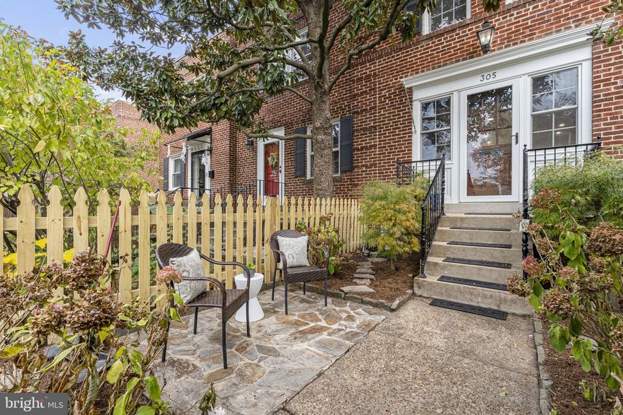 Offer deadline Monday  11/13 at noon. Welcome to 305 Mount Vernon Avenue in coveted Rosemont! This classic colonial townhome beautifully merges modern living with timeless charm. A veritable urban oasis in the heart of Alexandria, this home exudes tranquil appeal from the moment you step through the front gate and ascend the steps to the entry garden and pretty brick/white facade. Featuring two bedrooms, two full bathrooms, and a fully finished basement, this pristine single-family home is designed to accommodate your needs with 1,100 finished square feet, and lots of outdoor area to maximize your living and entertaining experience.

The main level is light and bright, with newly refinished mid-tone hardwood floors and soft white walls with crown molding. The open plan living/dining areas are well proportioned and welcoming - large enough to comfortably entertain and cozy enough to relax at home. The modern open kitchen was completely redone last year and features quartz countertops, brushed gold finishes and upgraded stainless steel appliances. There is plenty of countertop space and cabinets for ample storage in this gourmet kitchen. The back window sits atop the modern farmer sink and imbues the space with natural light from sky and treetop views. There is also a dining area right off the kitchen to enjoy a morning coffee while looking out to the rear deck through the Georgian style back door. The roomy deck has been newly repainted and offers space for a full outdoor suite of furniture to dine or relax (or work!) al fresco. Steps lead down to the back yard and garden area which is finished in matching brick and features mixed borders of perennial plantings. Private fencing completes the back area with a gate to the rear alley and a heavy duty plastic storage bin for your use.

The Upper level also features hardwood flooring, two bedrooms and a full bath. The primary bedroom has tall ceilings, two ample closets with built-ins, a ceiling fan with light, and lots of natural light streaming in from the front of the property - and view of the trees. The 2nd bedroom is flooded with light from the rear-facing window and features a large closet with built-ins. This space can equally be used as an office or den. The classic-style full bathroom completes this level and features a soaking tub, wainscoted walls and a Georgian window overlooking the back yard.

 The lower level was renovated in 2018 with an added full bathroom, complete with glass shower. The fully finished basement area comprises 300 square feet of living space, recessed lighting, two front-facing windows, brand new carpet and paint. This flex space can be used equally as a living room or as a 3rd bedroom/in-law suite. The laundry/storage room contains the HVAC unit which was replaced in 2020. The space has been newly painted with storage shelves added, and a rear door leading to the back yard/garden. 

With winding, tree-lined streets and classic architecture, Rosemont is one of Alexandria's most sought-after areas. Just a half mile to Braddock Road Metro and one mile to King Street Metro, your commute options are limitless. Experience the ease of city living as you're just minutes away from the historic charm of Old Town, with its cobblestone streets and waterfront views. Lena's, Grape & Bean, The Tasting Room are all within walking distance. Whole Foods and Trader Joe's are close by, as well as Solidcore, CVS and more. Conveniently located to Reagan National Airport (DCA), Pentagon and downtown DC. Welcome Home!