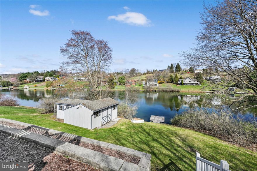 **New Listing — Lakefront Living on Fawn Lake**
Welcome to your dream retreat — a move-in ready, meticulously cared-for 3-bedroom, 2-bathroom 2,050 square foot home nestled on 0.4 acres of pristine lakefront property. Bright, clean, and brimming with character, this gem offers gorgeous sunset views and an easy stroll to the crystal clear waterfront. Step inside to a vaulted living room that creates an airy, open atmosphere, flowing effortlessly into the dining area and well-appointed kitchen — perfect for entertaining or quiet evenings at home.  3 bedrooms and an updated bathroom grace the main floor. The spacious basement is brimming with potential, ready for your personal vision. A family room and an additional bathroom plus laundry area and workshop space accommodate family and guests alike. Notable, functional features include Andersen sliding doors, two mini-split systems for efficient year-round heating and cooling, paved driveway, and on-site septic. Outside, the appeal continues. A large deck with superior views, stamped concrete patio, extensive hardscape with retaining walls, storage under the deck, a shed, and a floating dock enhance this property's outdoor living space. Fawn Lake is a private, 27-acre gem known as the "Little Lake" — specializing in non-motorized and electric-only boating, swimming, and fishing. With 45-foot depths, a dedicated boat launch, pavilion, and serene non-wake atmosphere, tranquility is guaranteed. The dam/spillway was repaired in 2009, and this lake is functioning at full pool. Located within the gated *Lake Wynonah community, residents enjoy 1,476 acres of rolling hills, 27 miles of paved roads, a community pool, lodge, and crystal-clear waters. This is lakefront living at its finest. *Please call the Lake Wynonah Business Office for updates on the "big lake"/Lake Wynonah Dam rehabilitation project and probable future assessment.