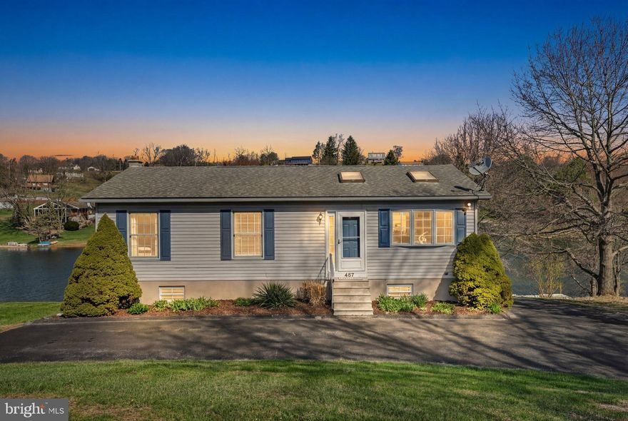 **New Listing — Lakefront Living on Fawn Lake**
Welcome to your dream retreat — a move-in ready, meticulously cared-for 3-bedroom, 2-bathroom 2,050 square foot home nestled on 0.4 acres of pristine lakefront property. Bright, clean, and brimming with character, this gem offers gorgeous sunset views and an easy stroll to the crystal clear waterfront. Step inside to a vaulted living room that creates an airy, open atmosphere, flowing effortlessly into the dining area and well-appointed kitchen — perfect for entertaining or quiet evenings at home.  3 bedrooms and an updated bathroom grace the main floor. The spacious basement is brimming with potential, ready for your personal vision. A family room and an additional bathroom plus laundry area and workshop space accommodate family and guests alike. Notable, functional features include Andersen sliding doors, two mini-split systems for efficient year-round heating and cooling, paved driveway, and on-site septic. Outside, the appeal continues. A large deck with superior views, stamped concrete patio, extensive hardscape with retaining walls, storage under the deck, a shed, and a floating dock enhance this property's outdoor living space. Fawn Lake is a private, 27-acre gem known as the "Little Lake" — specializing in non-motorized and electric-only boating, swimming, and fishing. With 45-foot depths, a dedicated boat launch, pavilion, and serene non-wake atmosphere, tranquility is guaranteed. The dam/spillway was repaired in 2009, and this lake is functioning at full pool. Located within the gated *Lake Wynonah community, residents enjoy 1,476 acres of rolling hills, 27 miles of paved roads, a community pool, lodge, and crystal-clear waters. This is lakefront living at its finest. *Please call the Lake Wynonah Business Office for updates on the "big lake"/Lake Wynonah Dam rehabilitation project and probable future assessment.